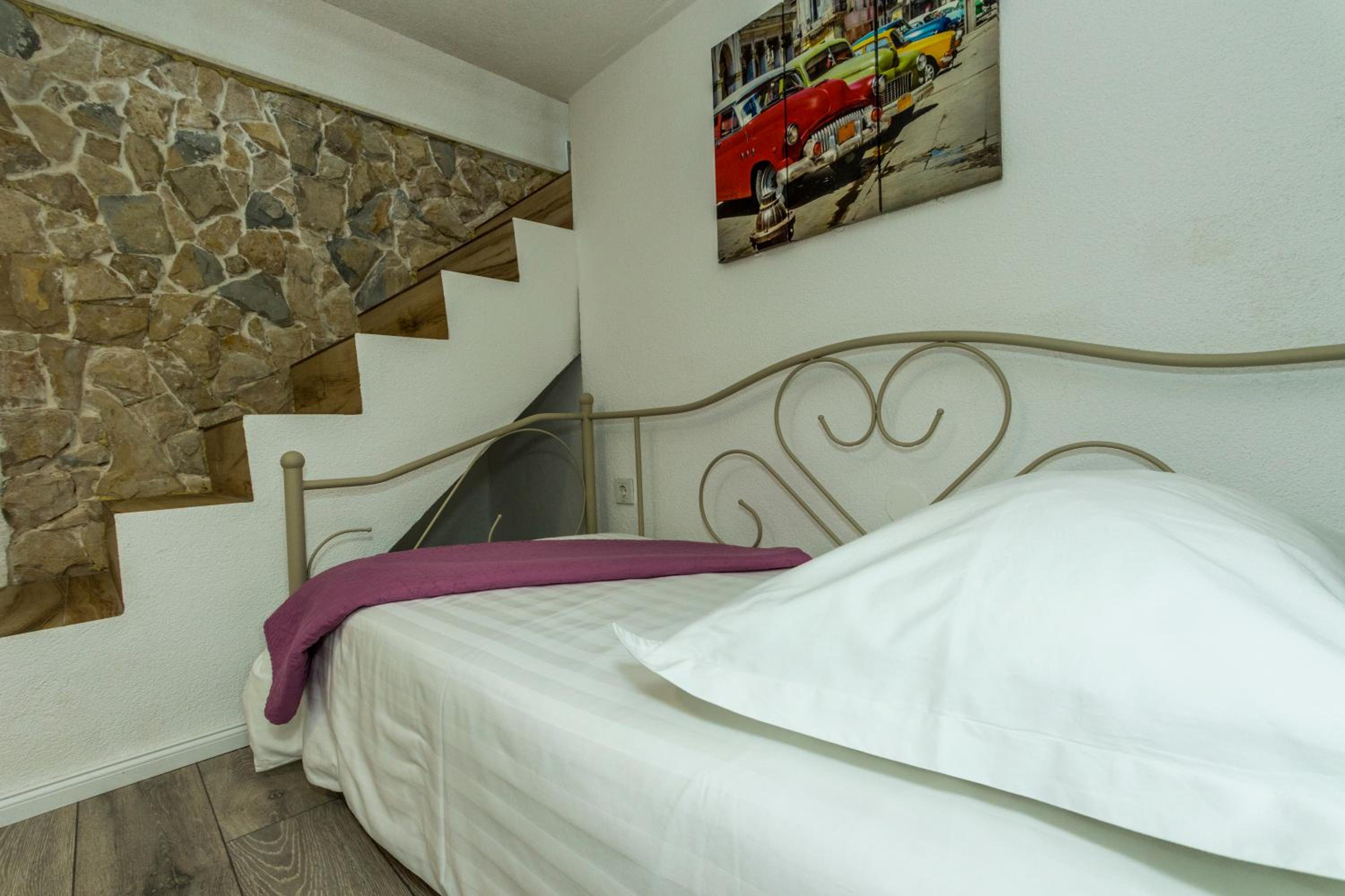 Three-Bedroom Apartment - Photo 12