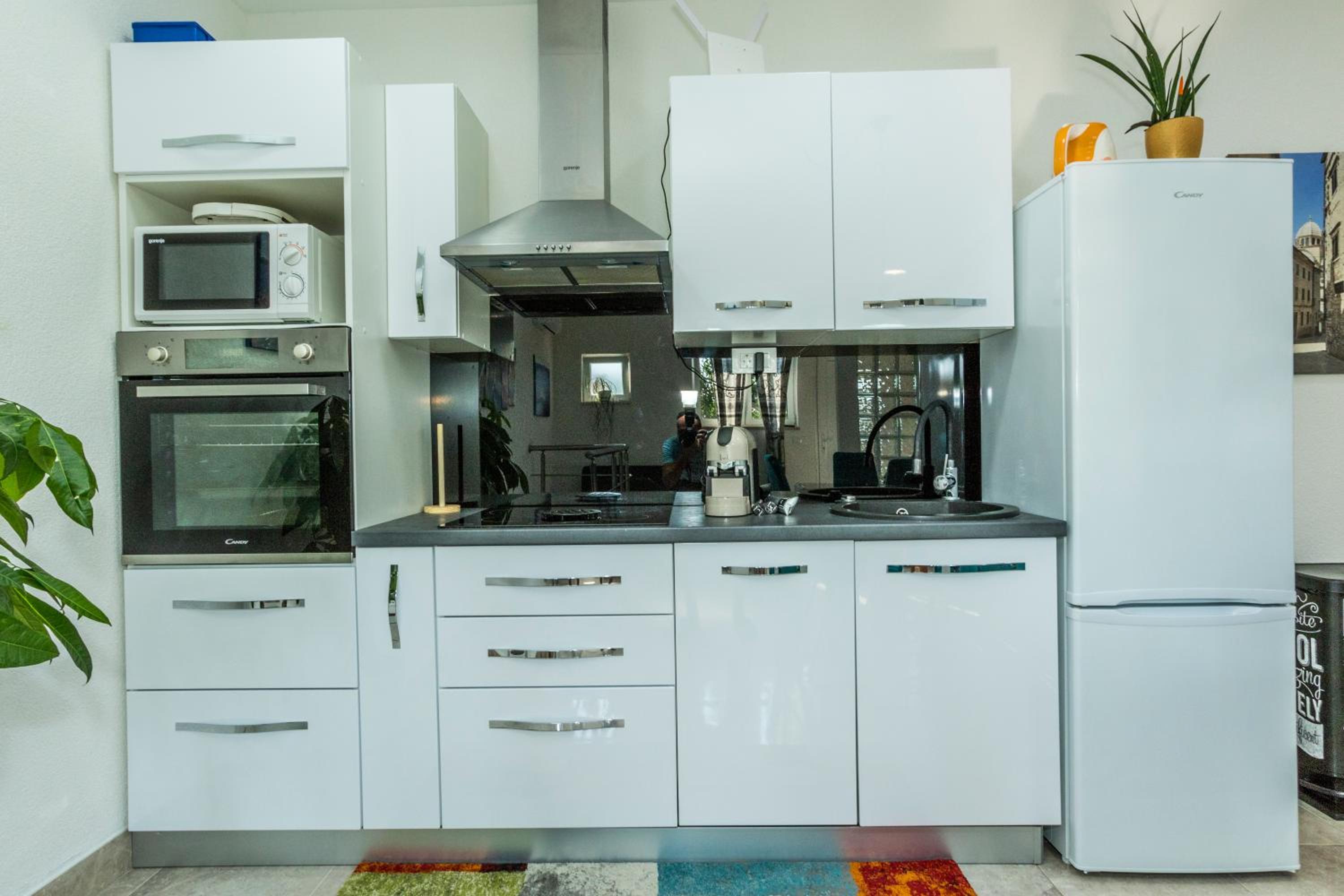 Three-Bedroom Apartment - Photo 26