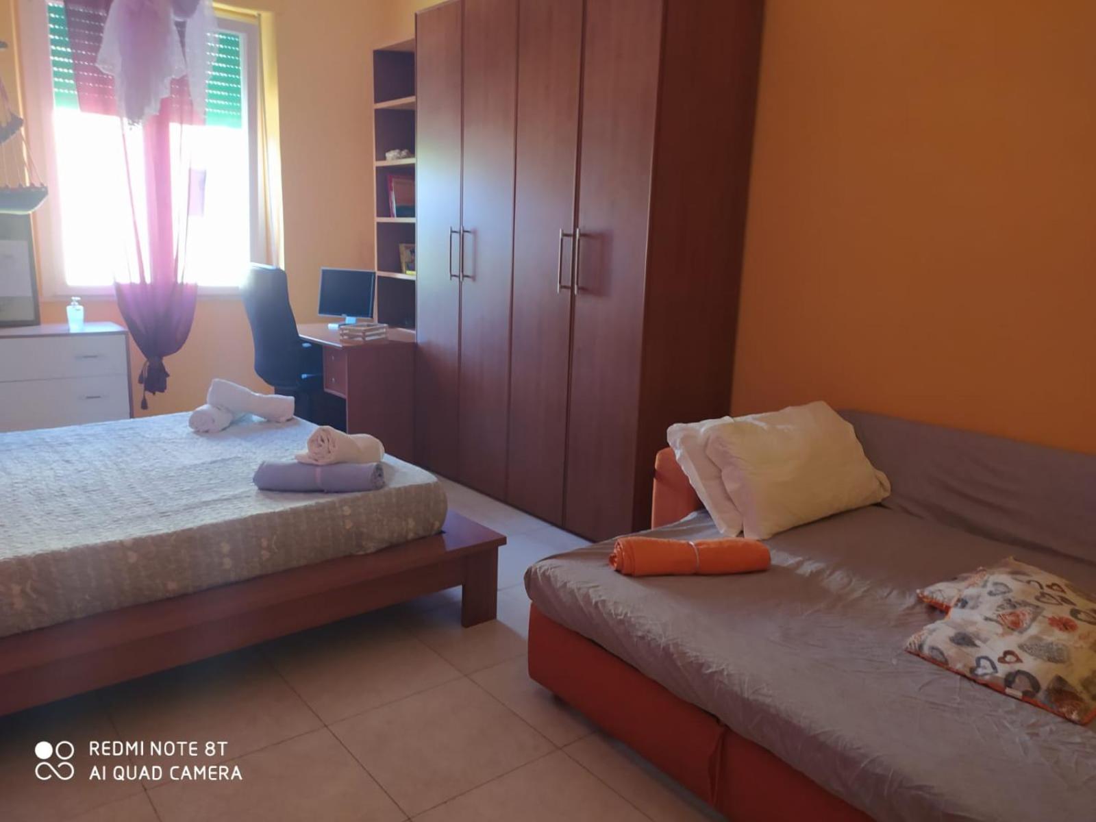 Queen Room with Shared Bathroom