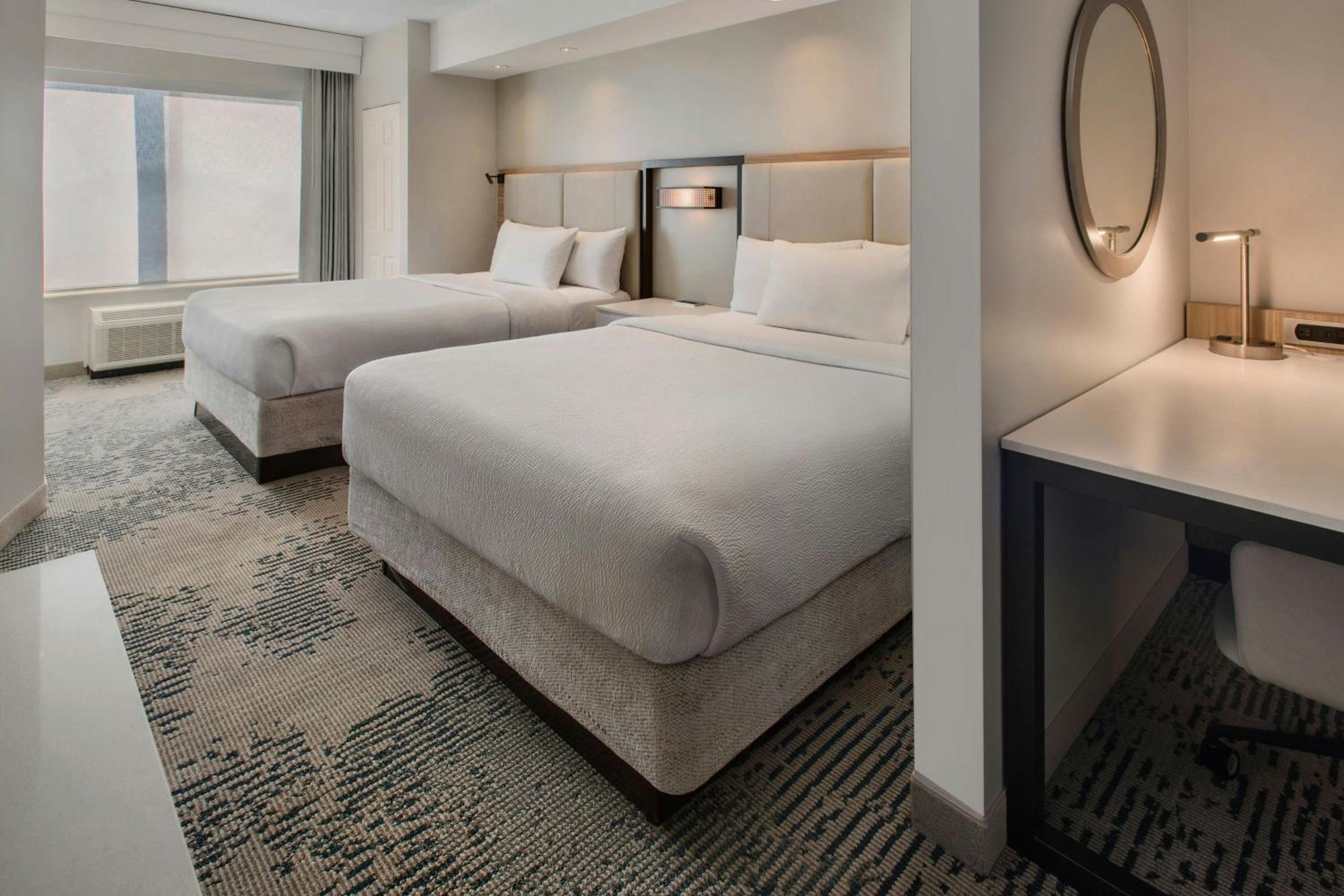 Queen Suite with Two Queen Beds and Trundle Sofa