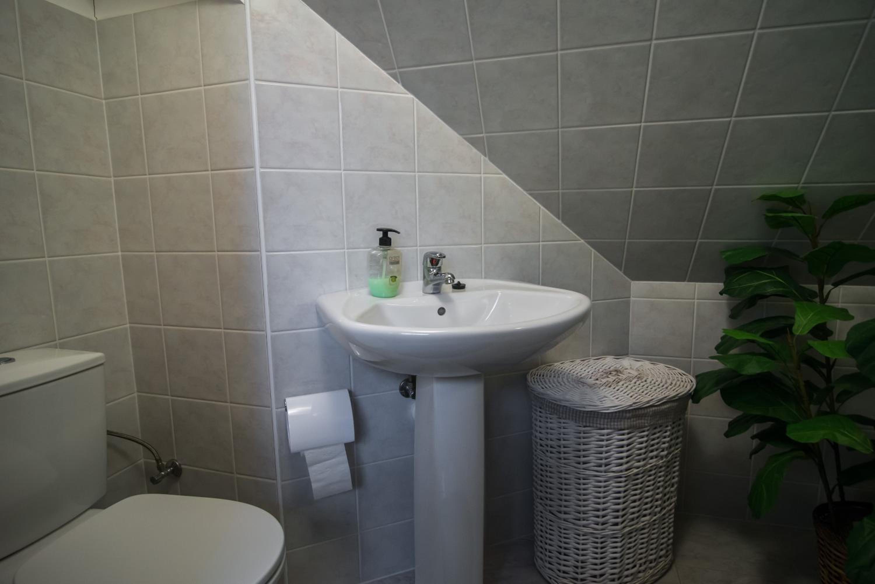 Three-Bedroom House - Photo 38