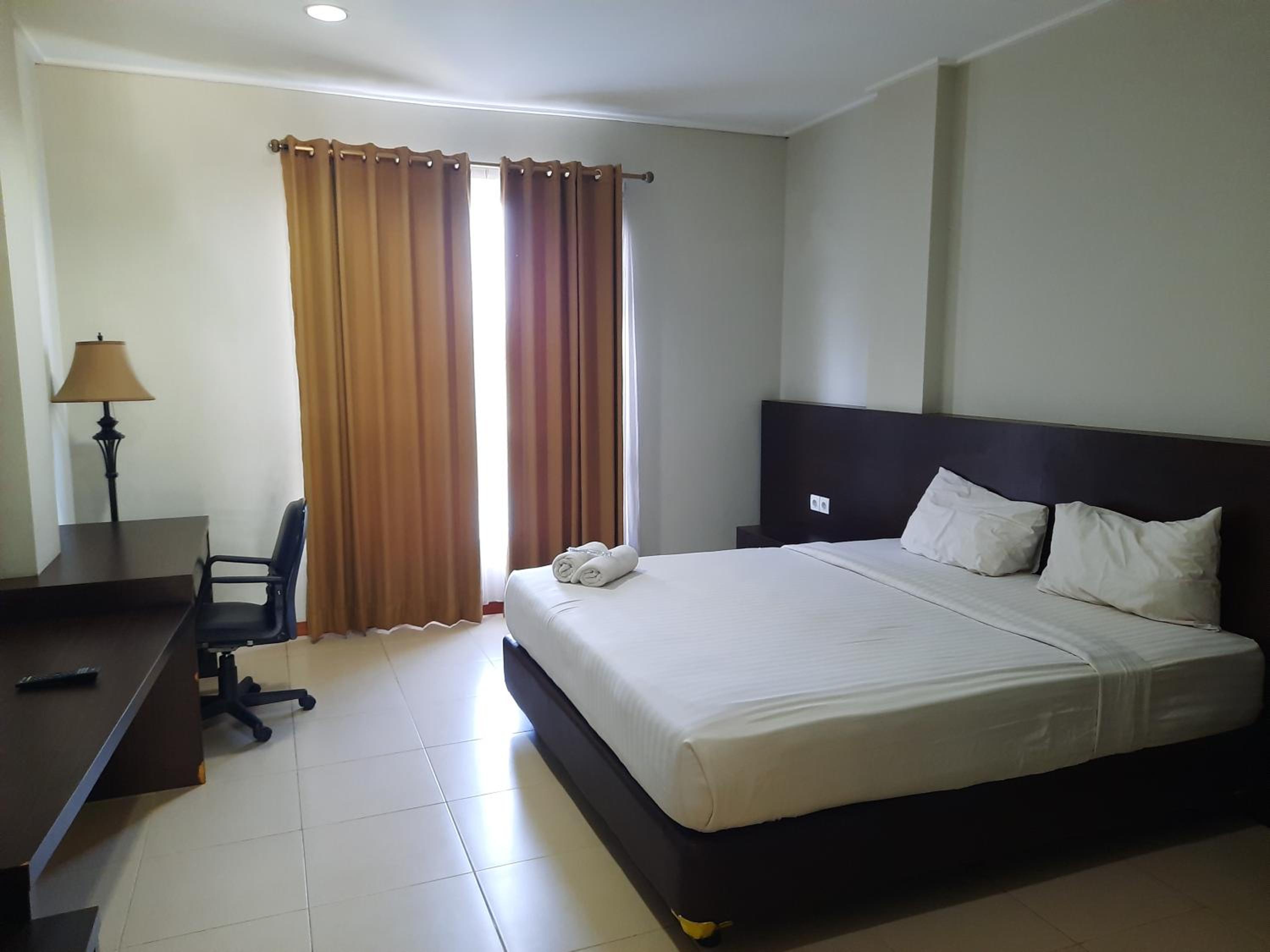 Deluxe Double Room - Photo 9