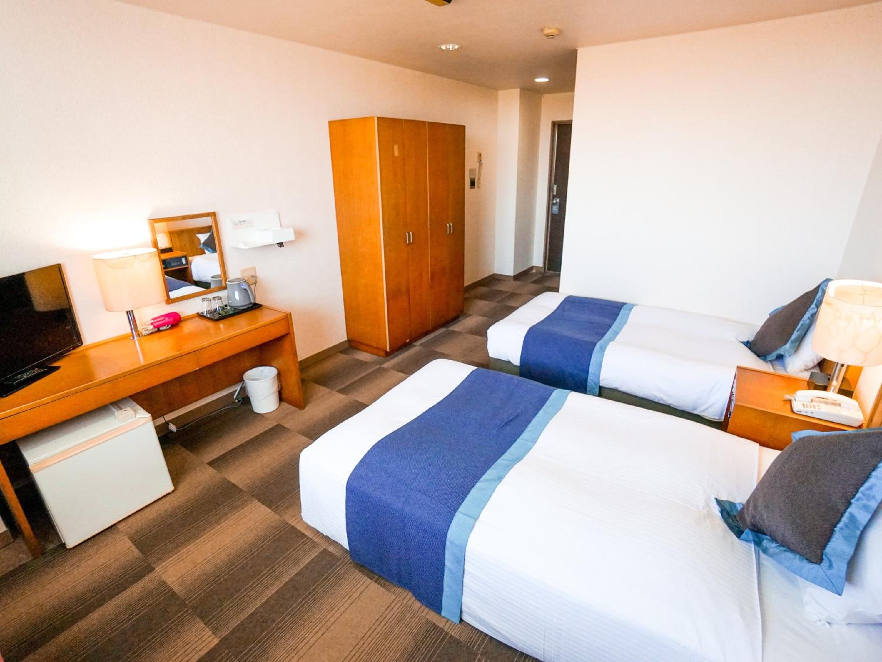 Standard Twin Room - Photo 1