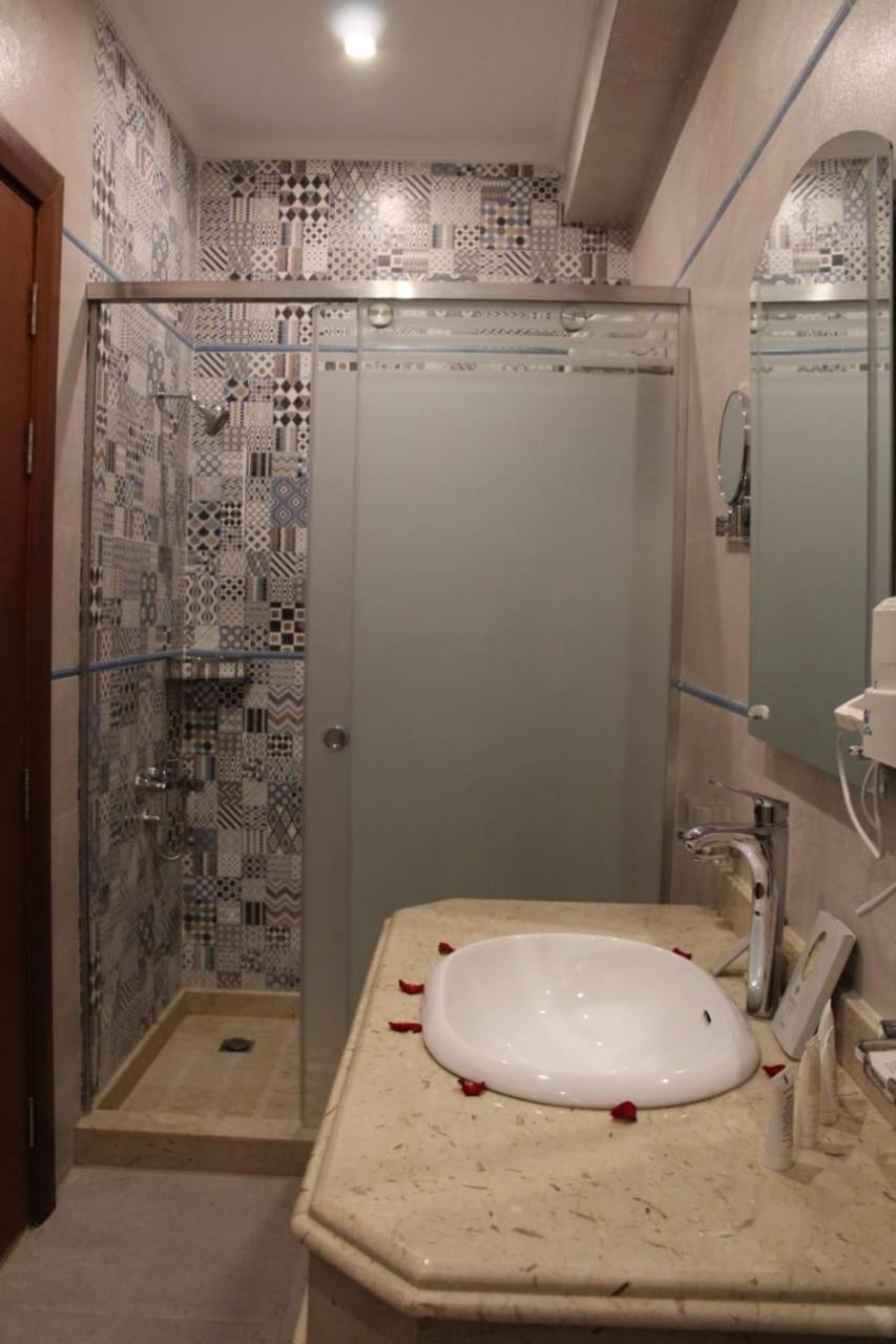 Double or Twin Room with Side Sea View and Garden View photo 3