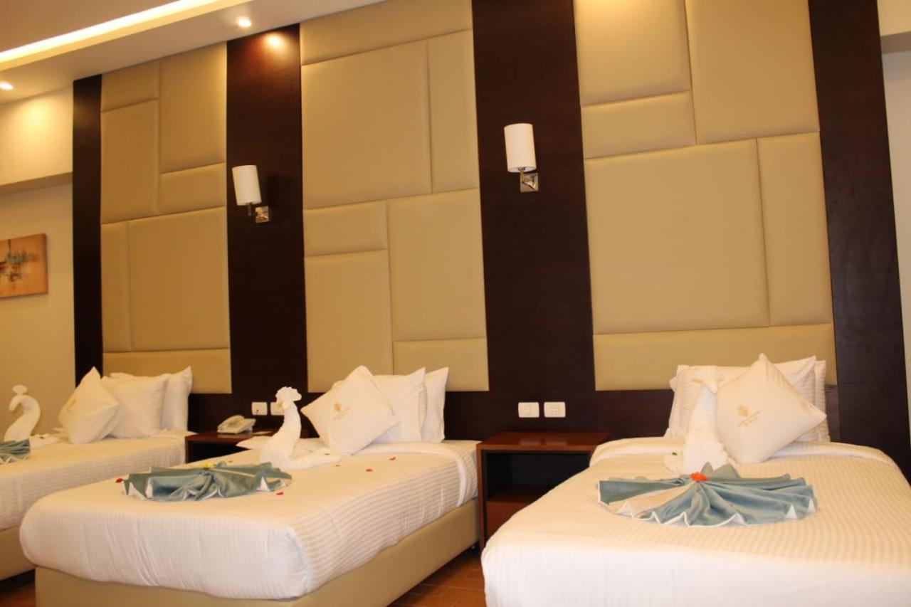 Triple Room with Side Sea View and Garden View