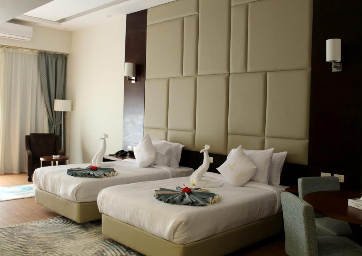 Double or Twin Room with Side Sea View and Garden View