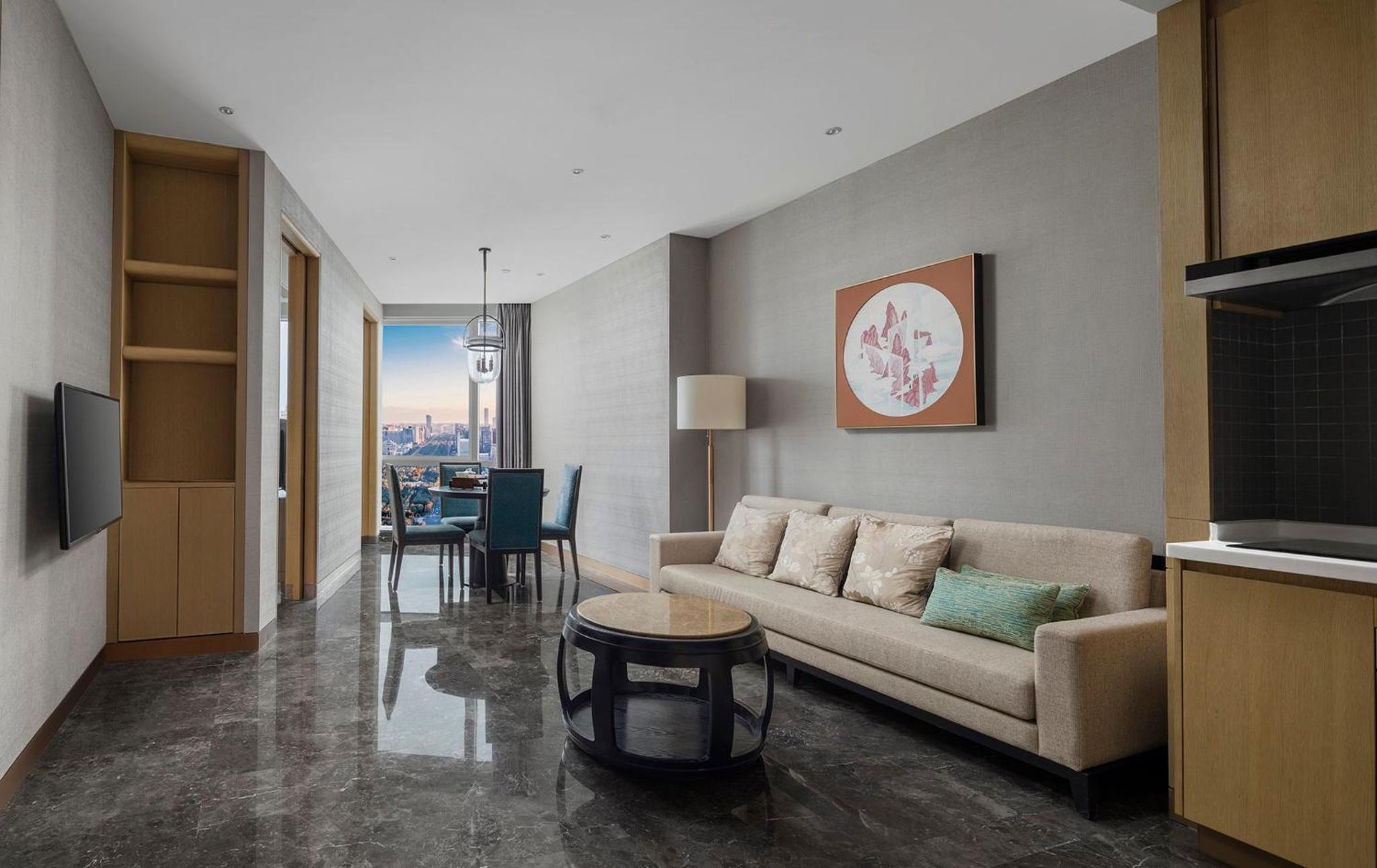 Premium King Room with One Single Bed and Kitchen