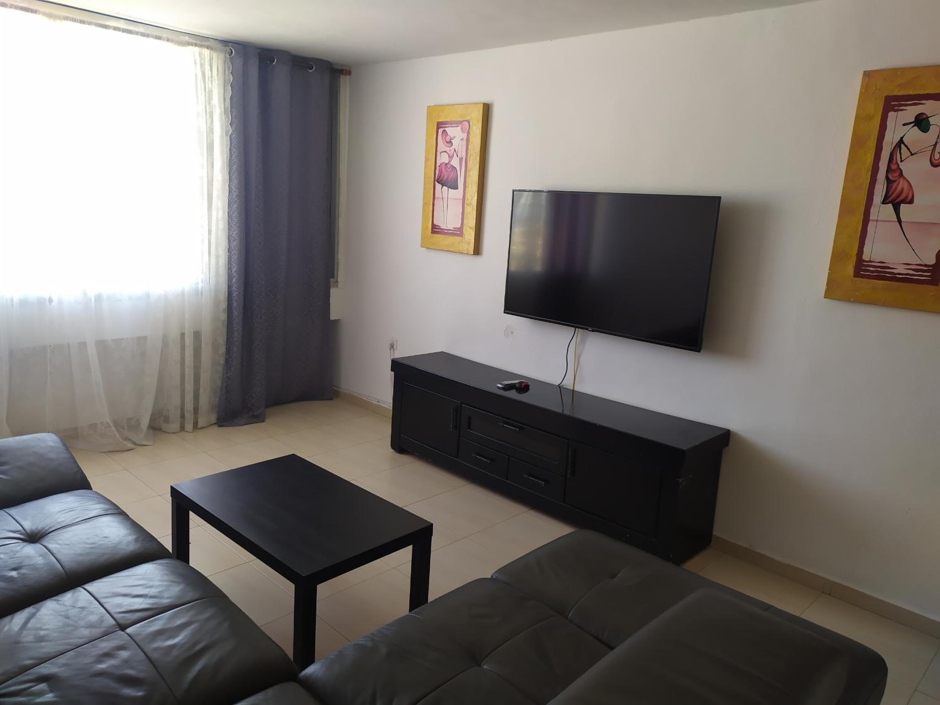 Three-Bedroom Apartment - Photo 15