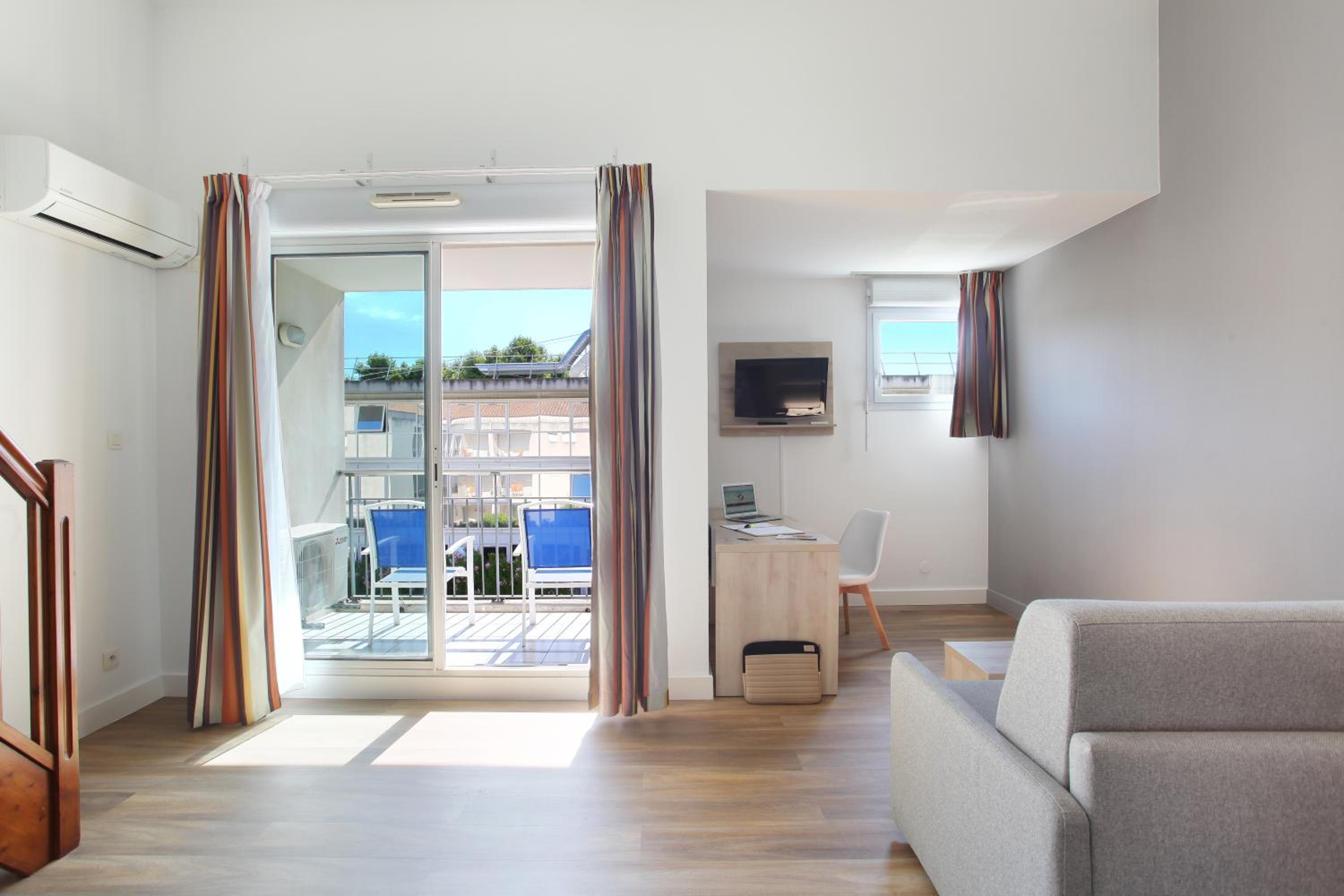 One-Bedroom Apartment (4 Adults) - Photo 1