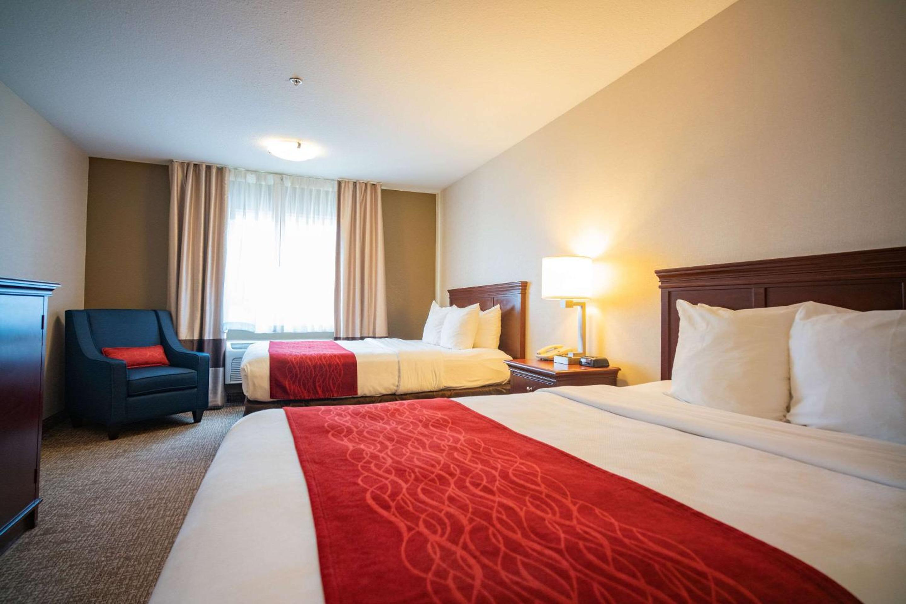 Queen Room with Two Queen Beds - Non-Smoking - Photo 1