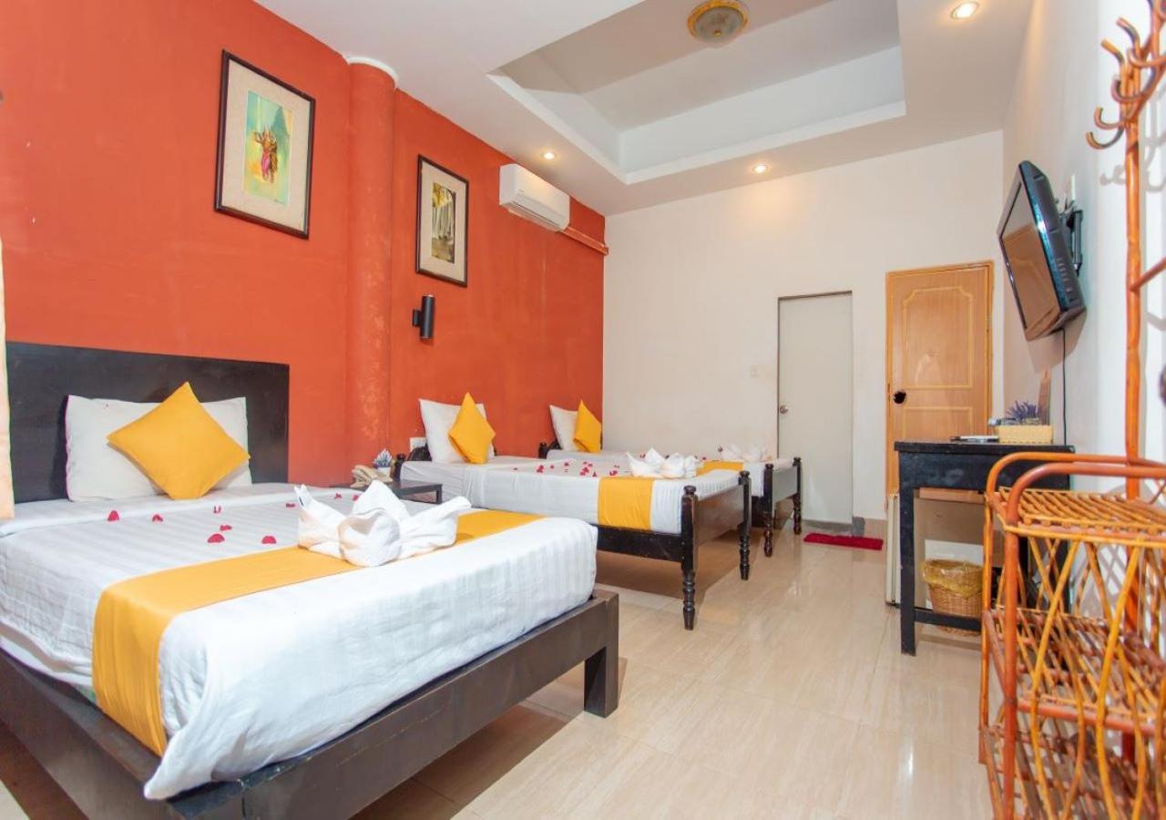 Standard Triple Room - No Window photo 2