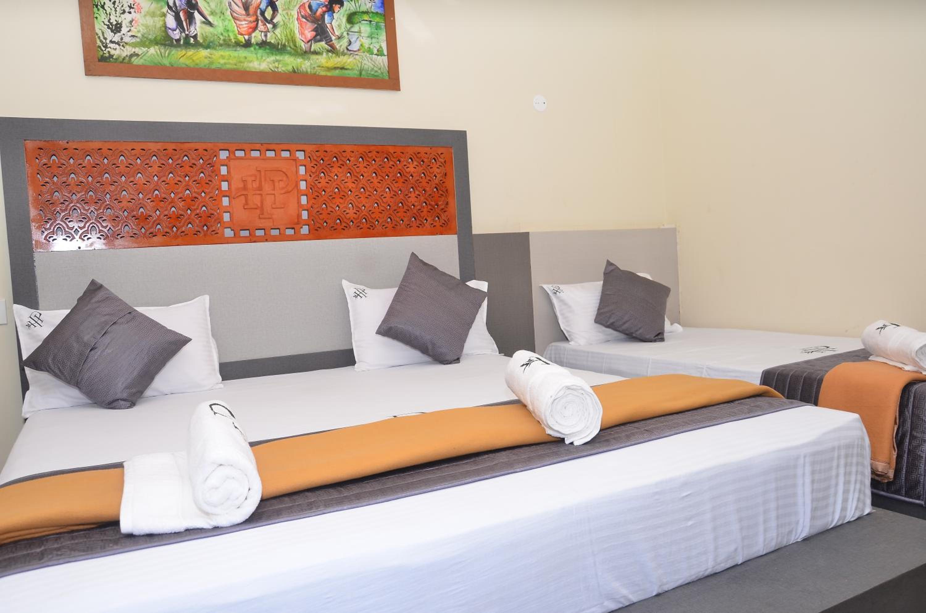 Deluxe Triple Room - Photo 8