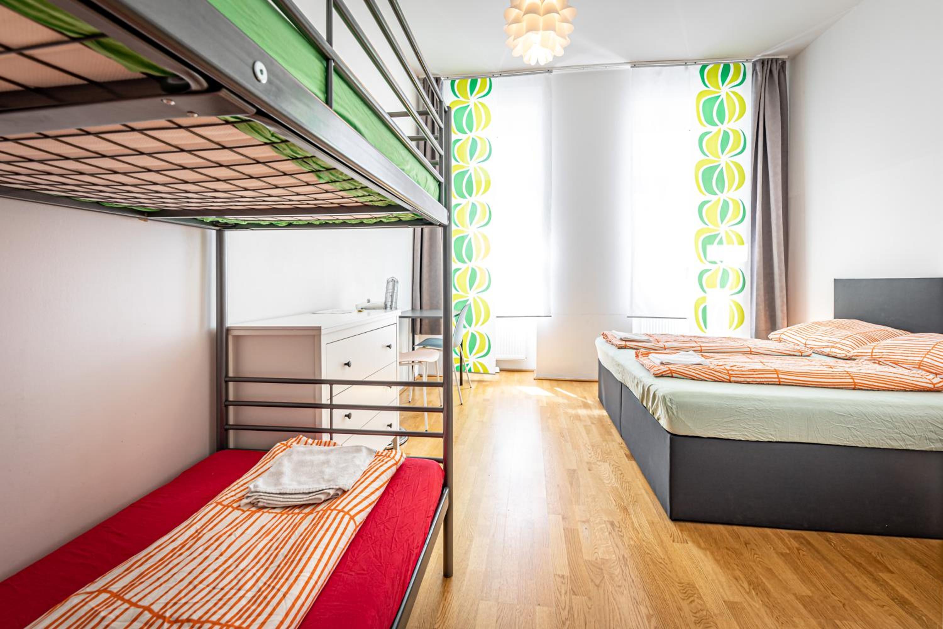 Room In Apartment With Double Bed And Bunk Bed