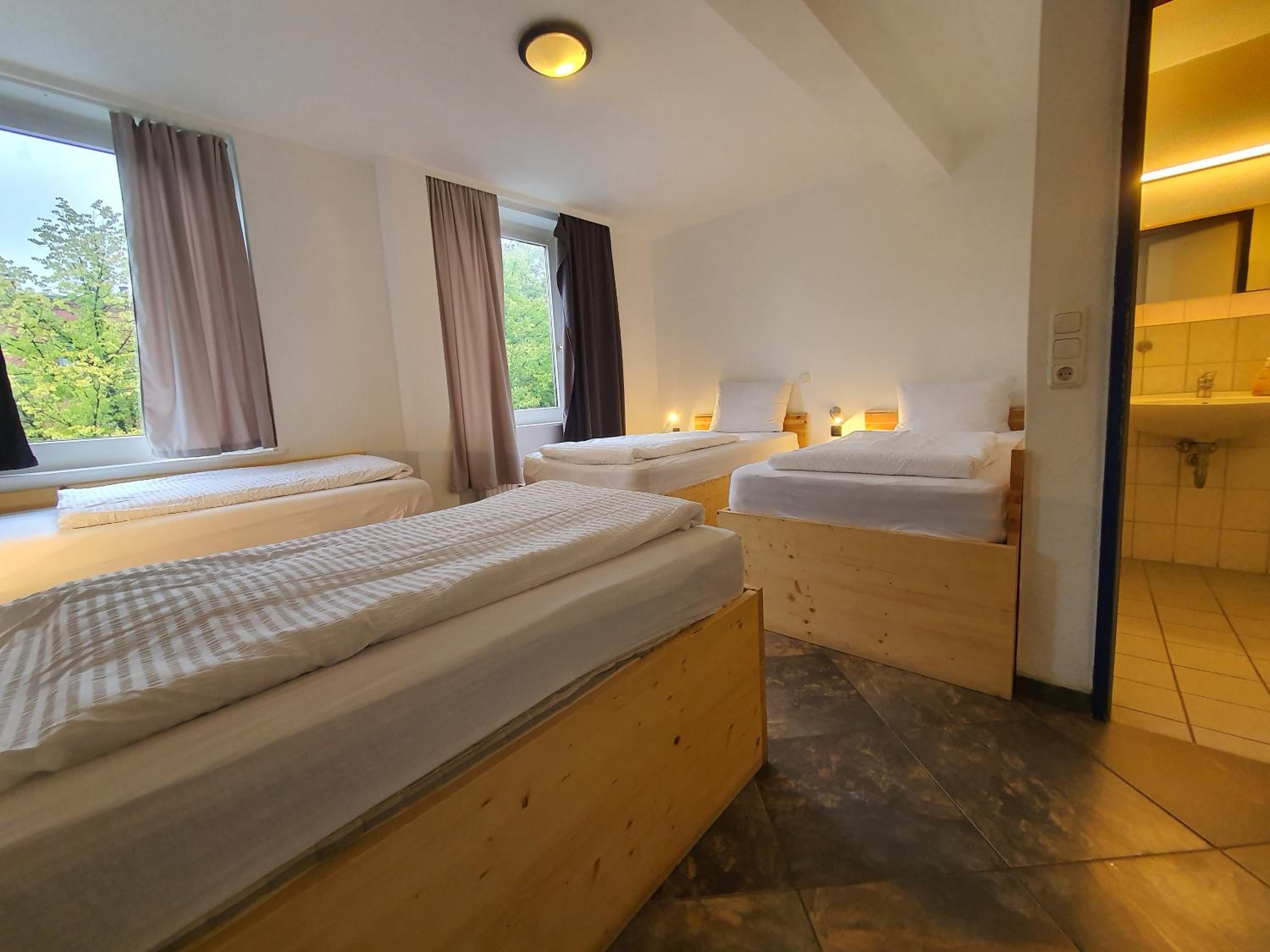 Quadruple Room with Private Bathroom