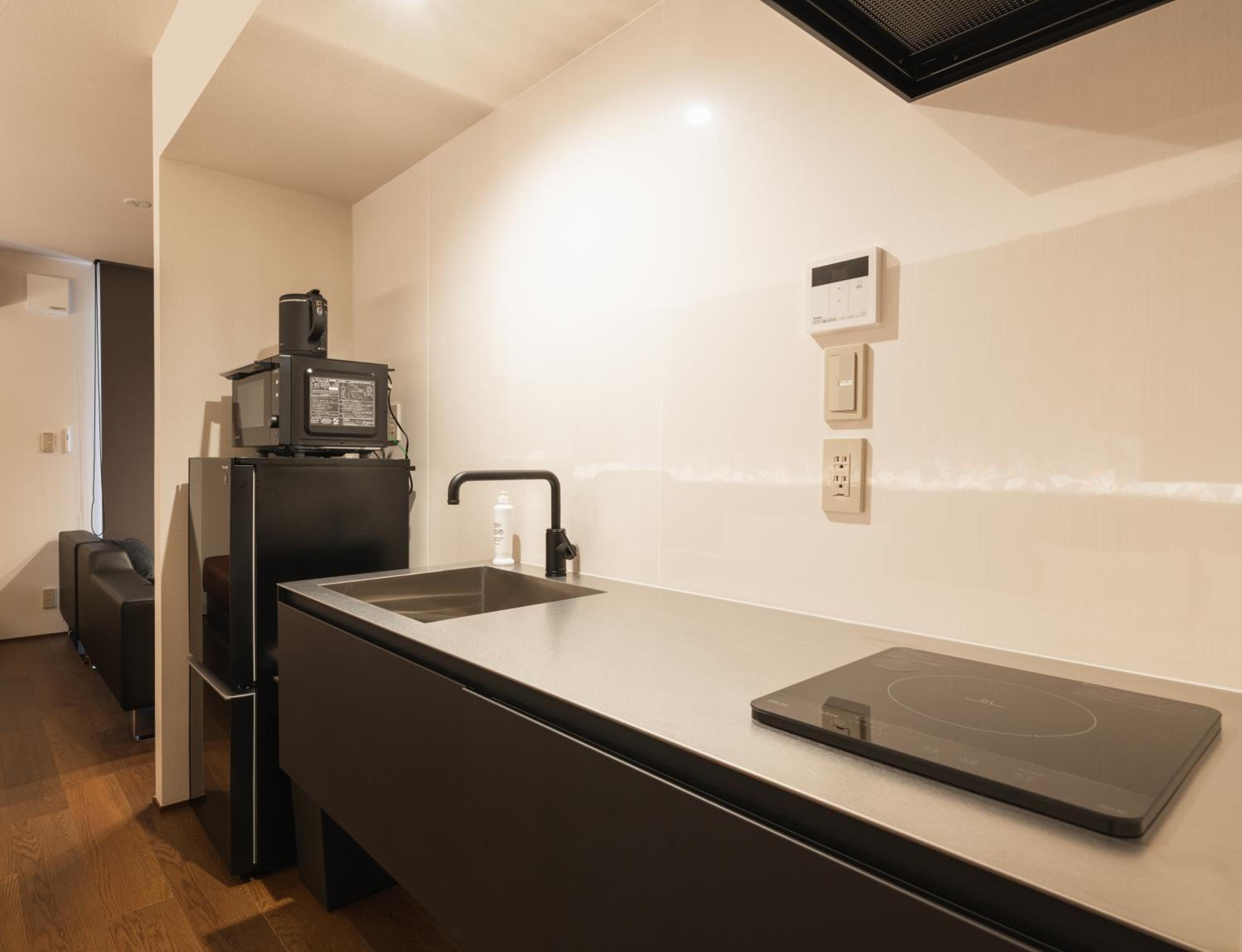 Deluxe Triple Room - Photo 14