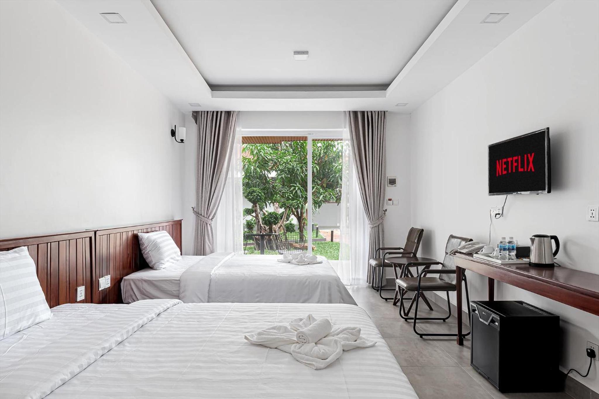 Deluxe Twin Room - Photo 2