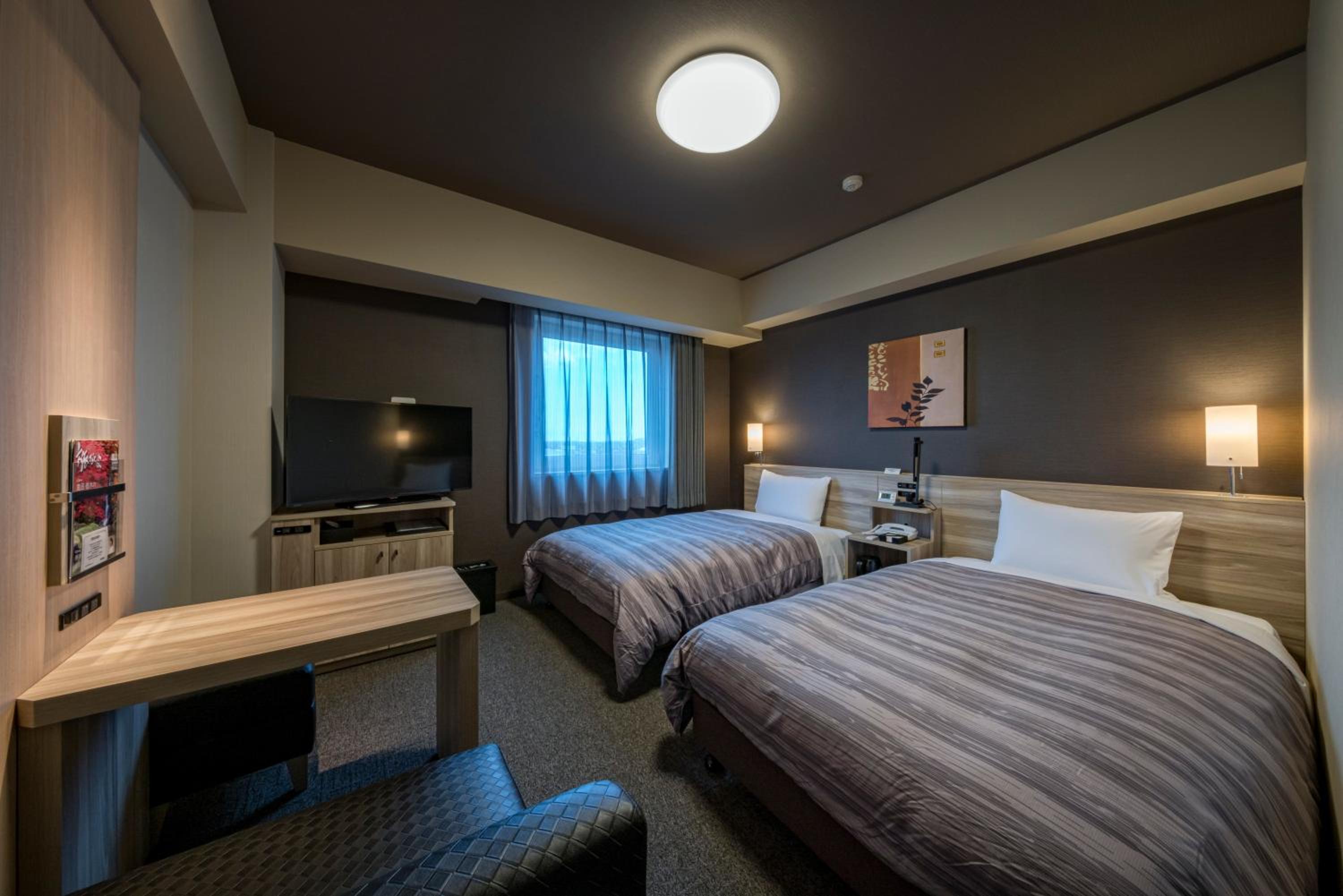 Twin Room - Non-Smoking - Photo 1