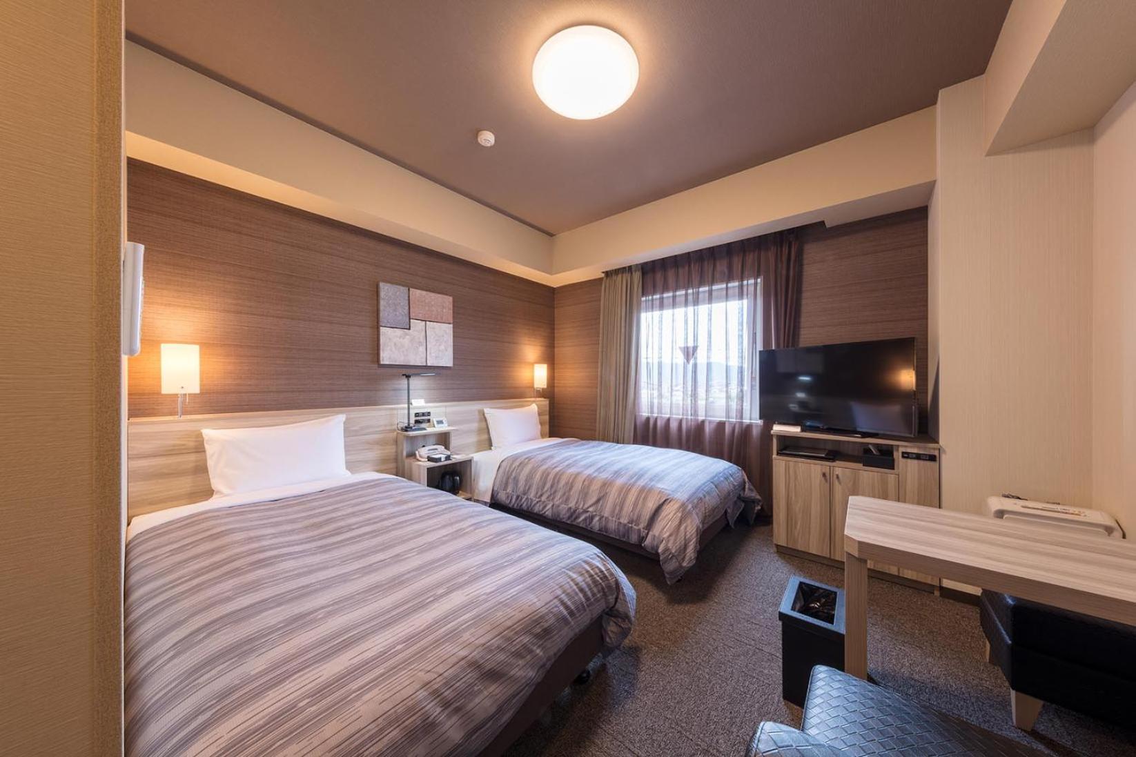Twin Room - Non-Smoking - Photo 1