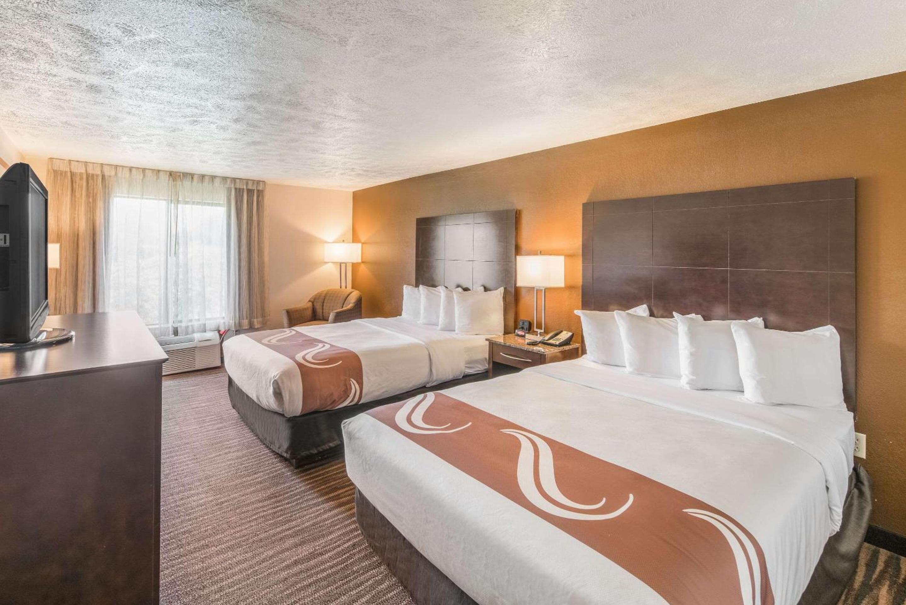 Queen Room with Two Queen Beds - Non-Smoking - Photo 1