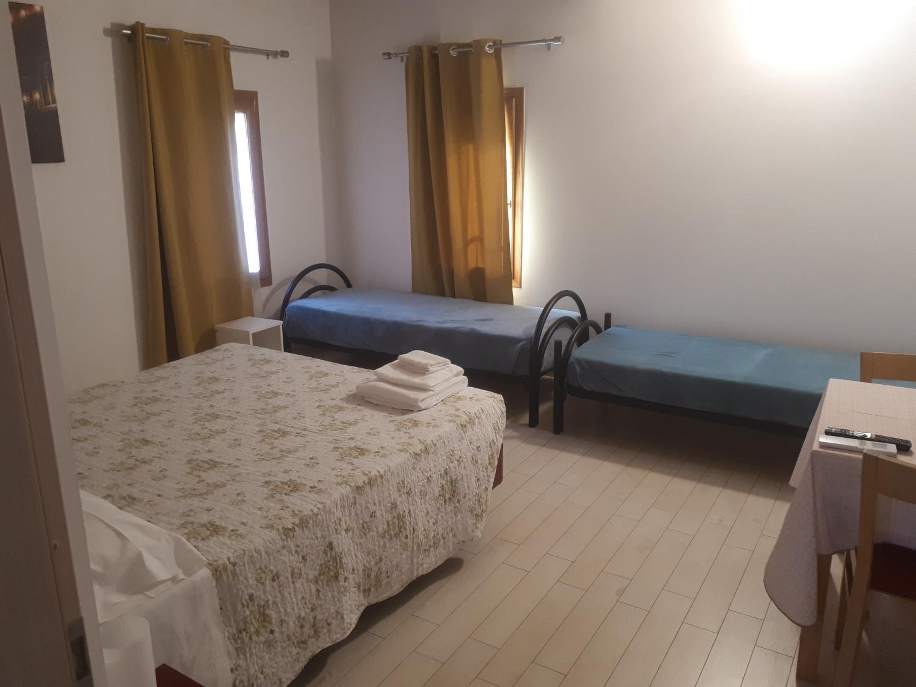 Quadruple Room with Private Bathroom photo 2