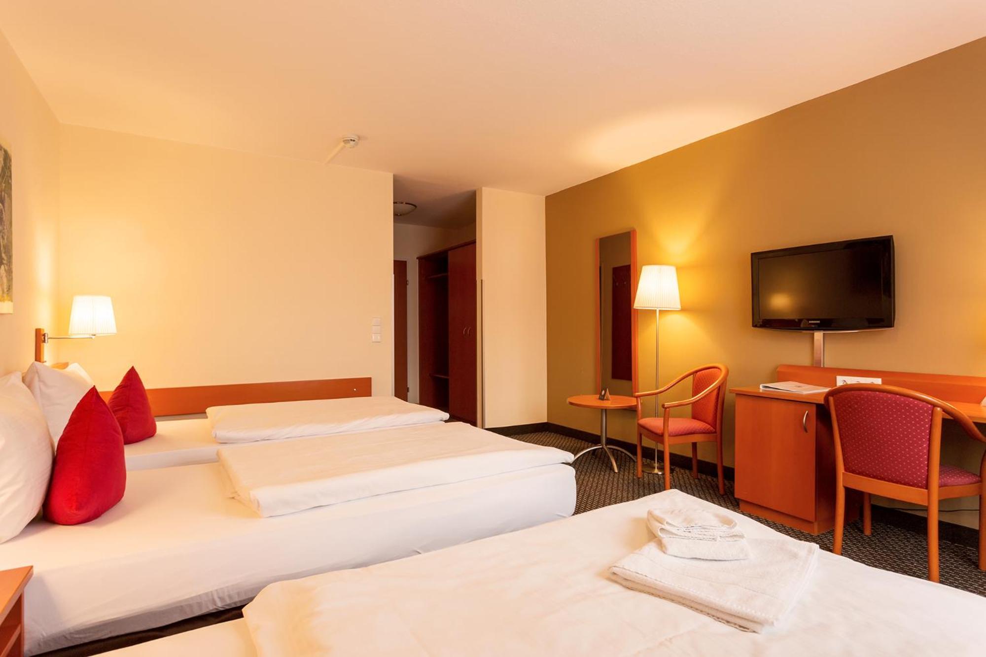 Triple Room - Photo 1