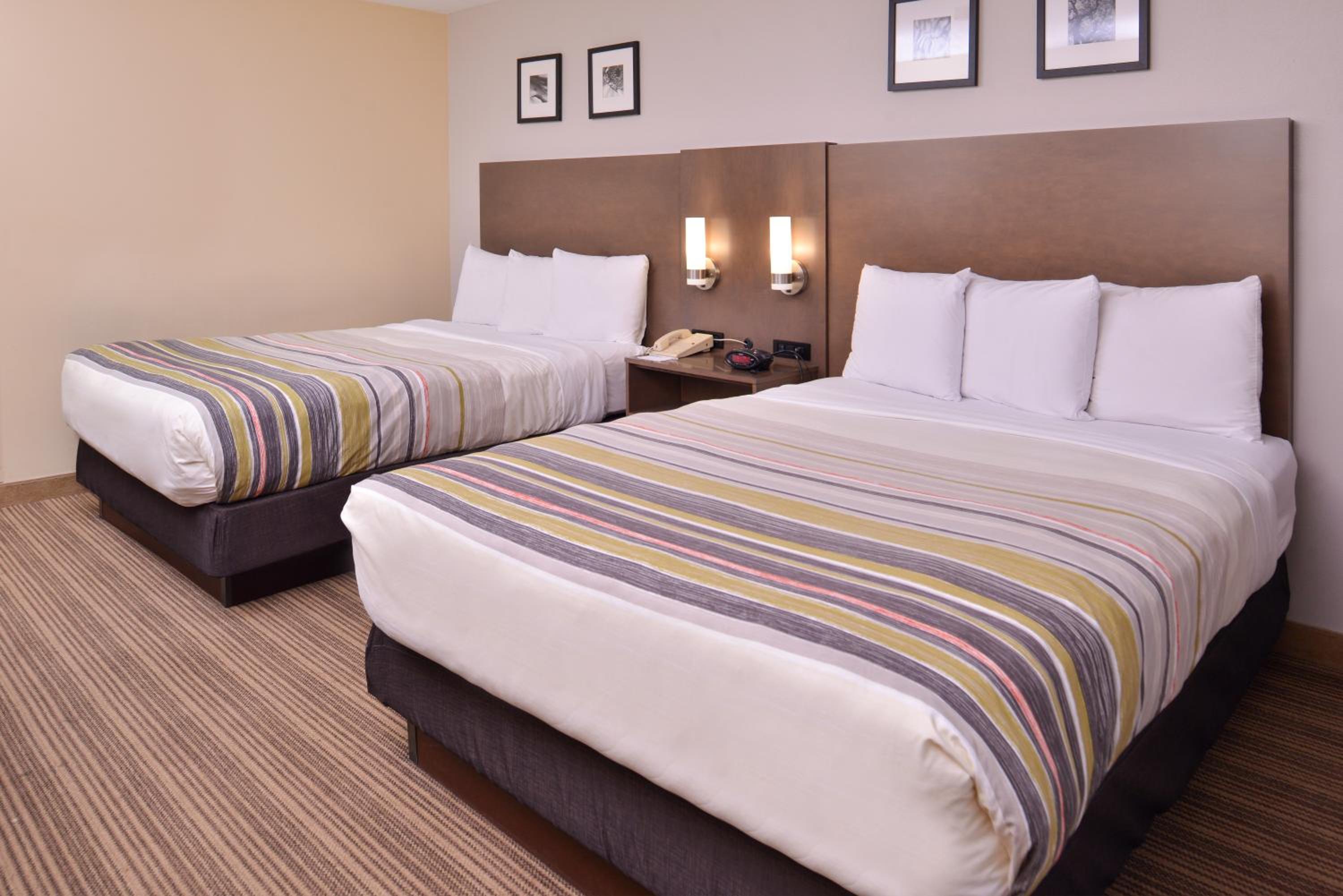 Queen Room with Two Queen Beds - Photo 1