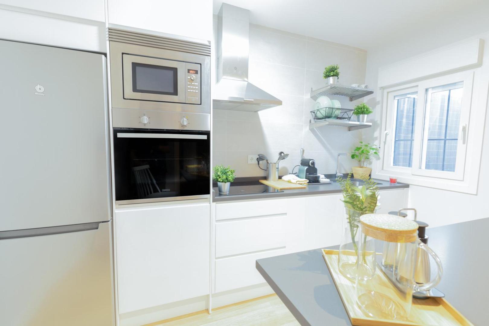 Three-Bedroom Apartment - Photo 2