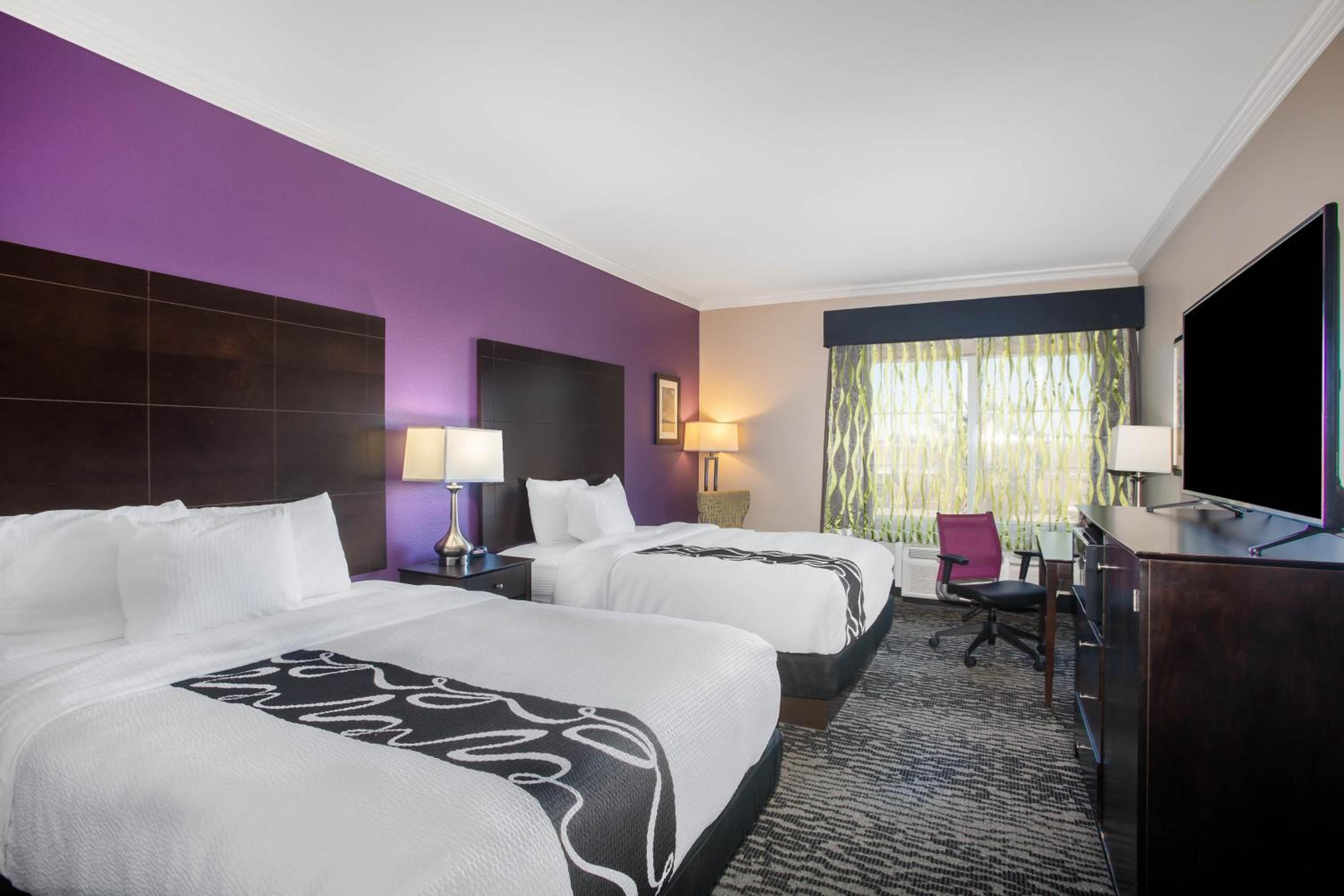 Deluxe Queen Room with Two Queen Beds - Photo 1
