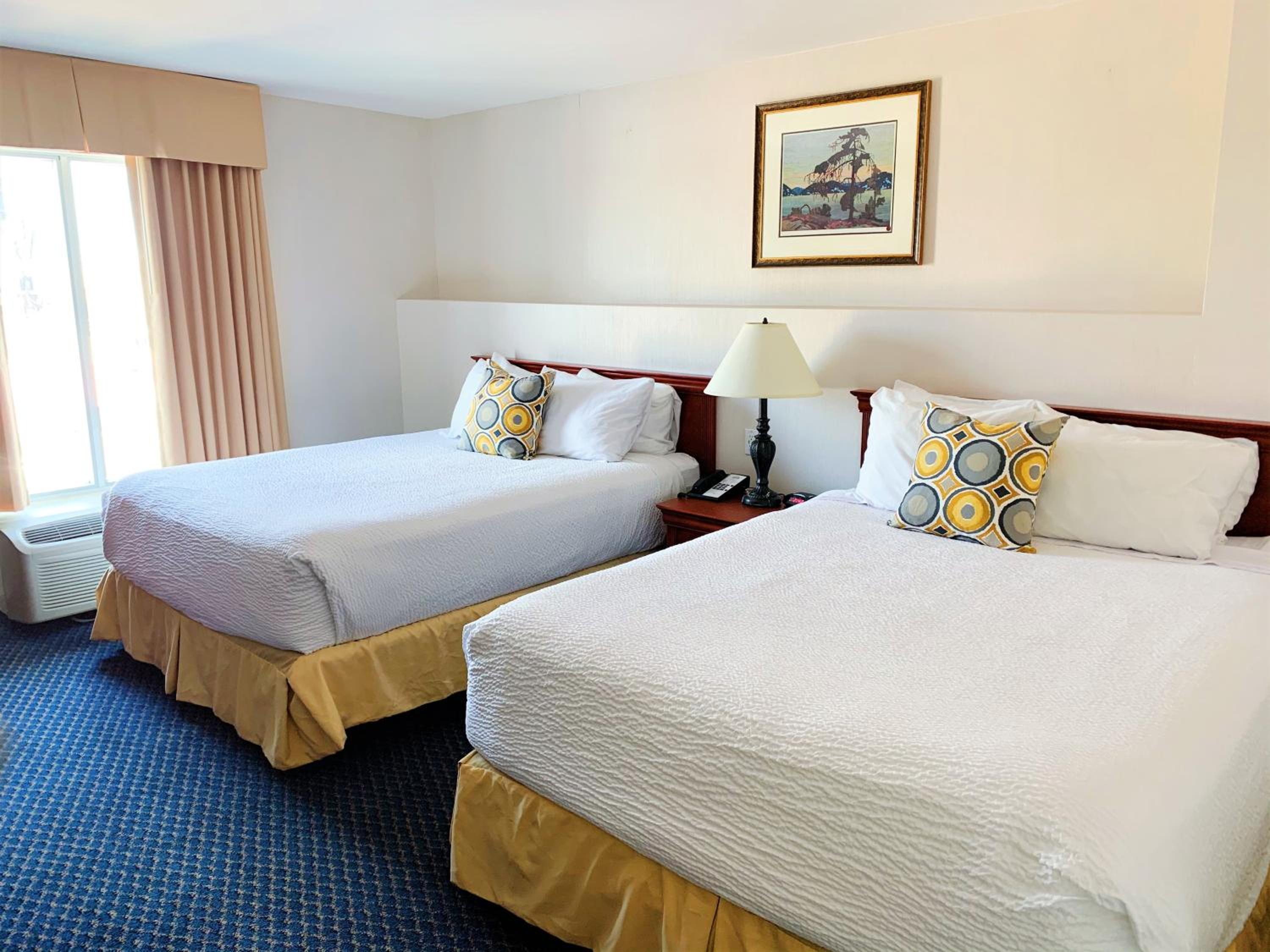 Suite with Two Queen Beds and Sofa Bed