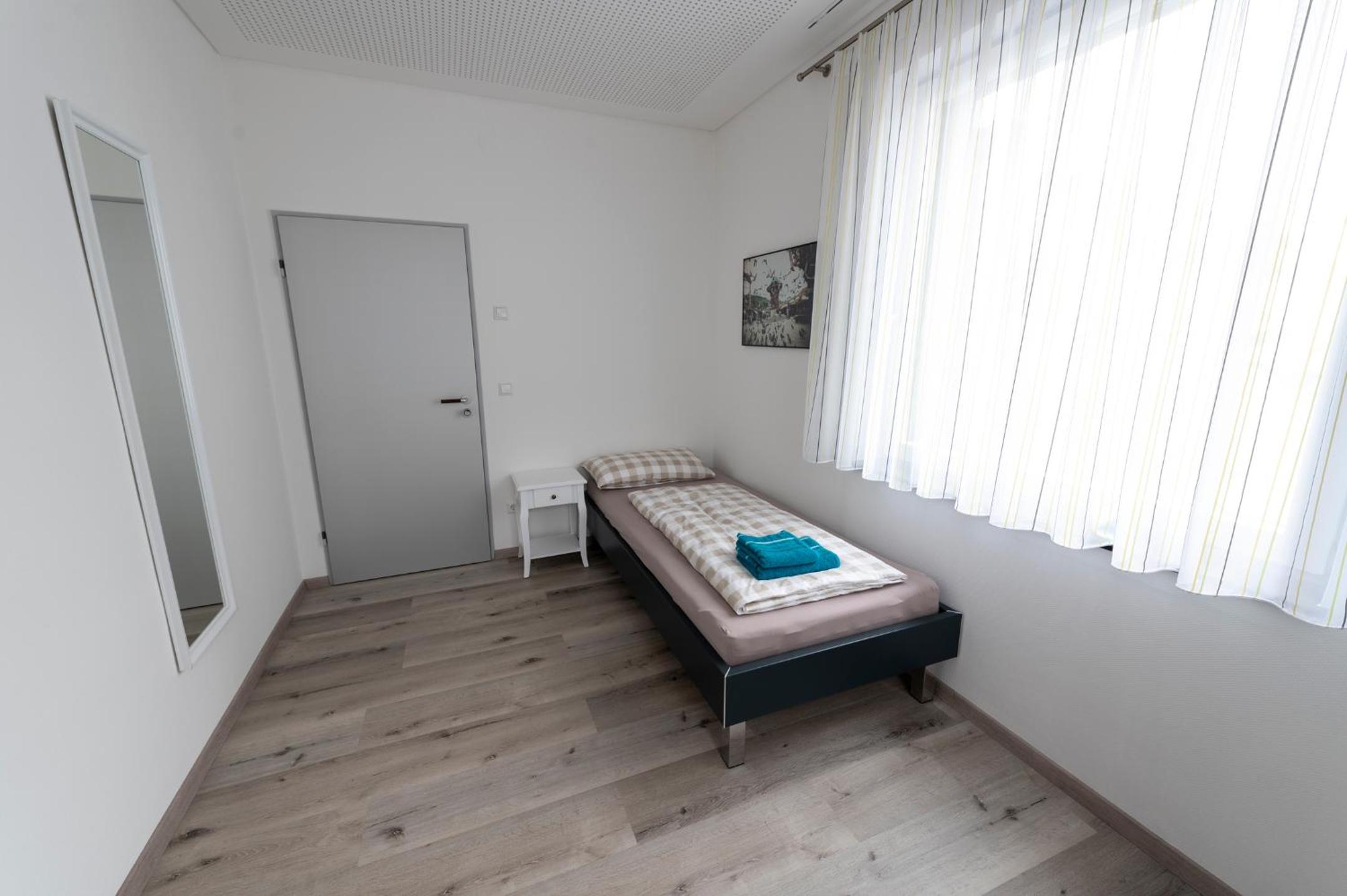 Single Room with Shared Bathroom