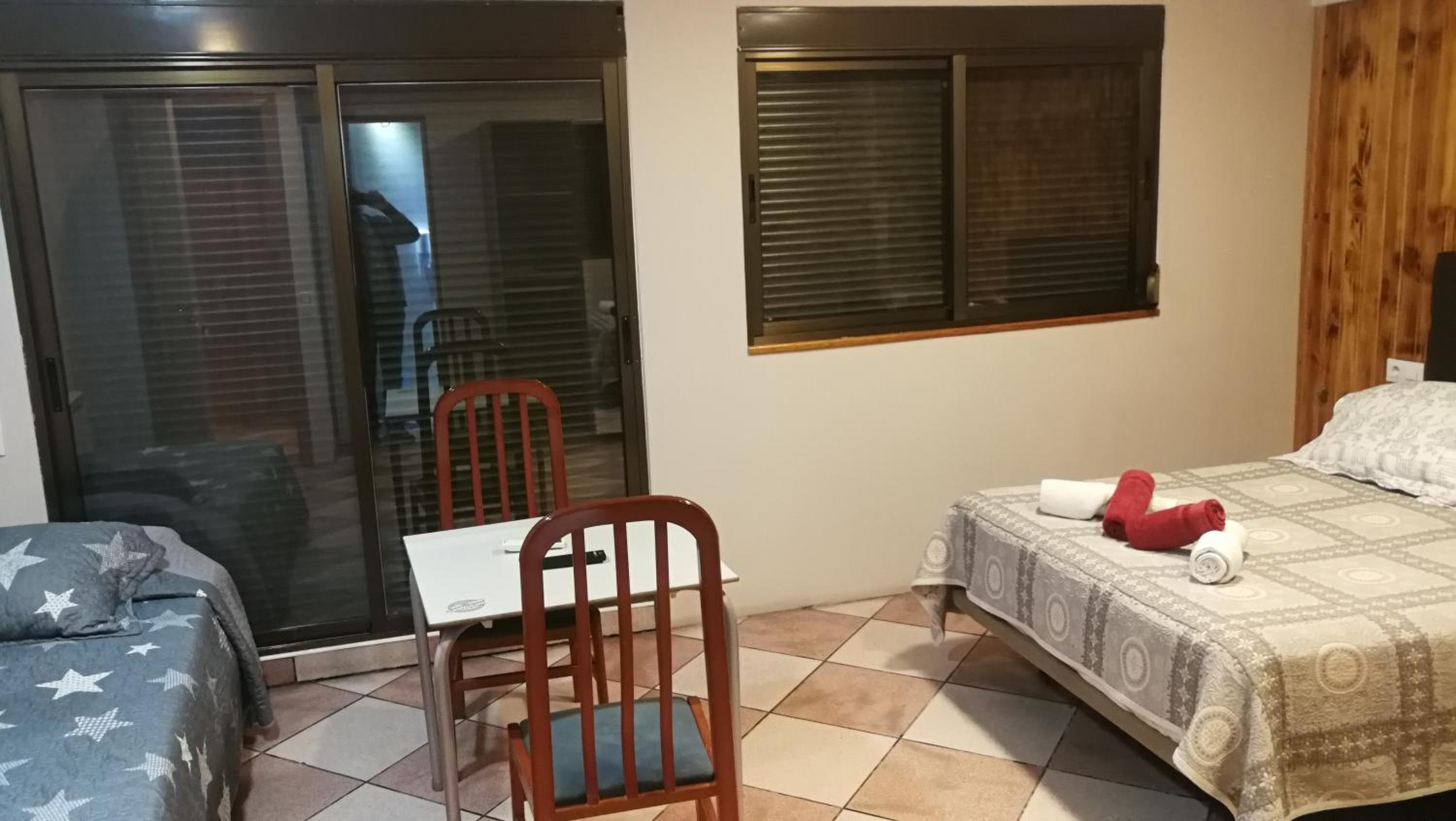 Habitación triple con terraza