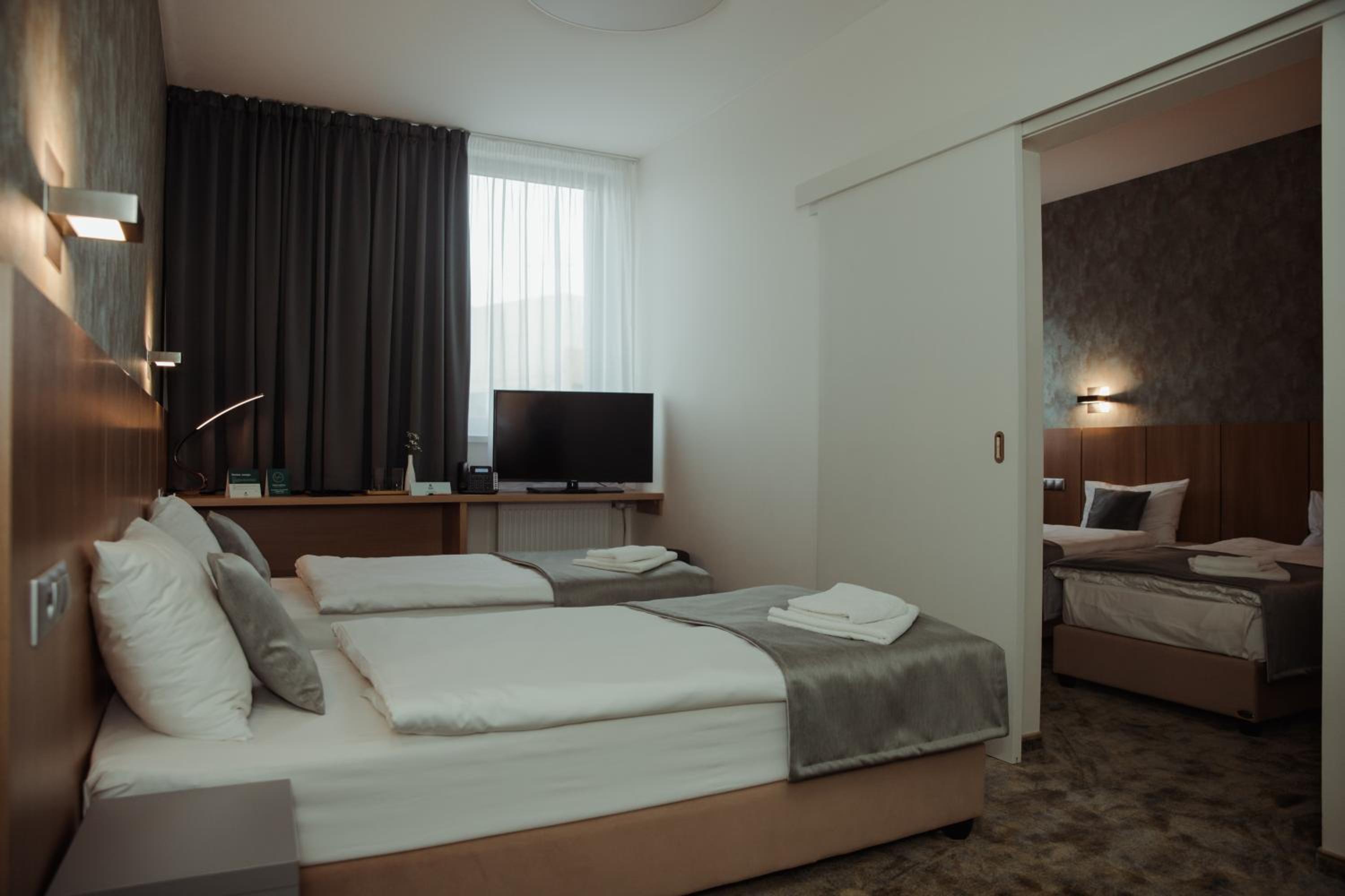 Standard Quadruple Room - Photo 3