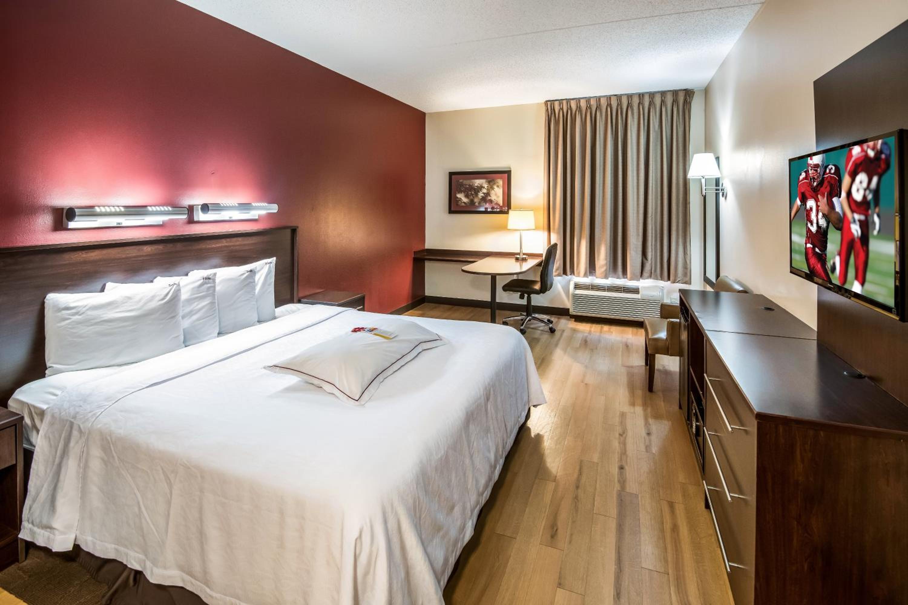 Premium King Room Smoke Free (Upgraded Bedding and Snack Box) - Photo 1
