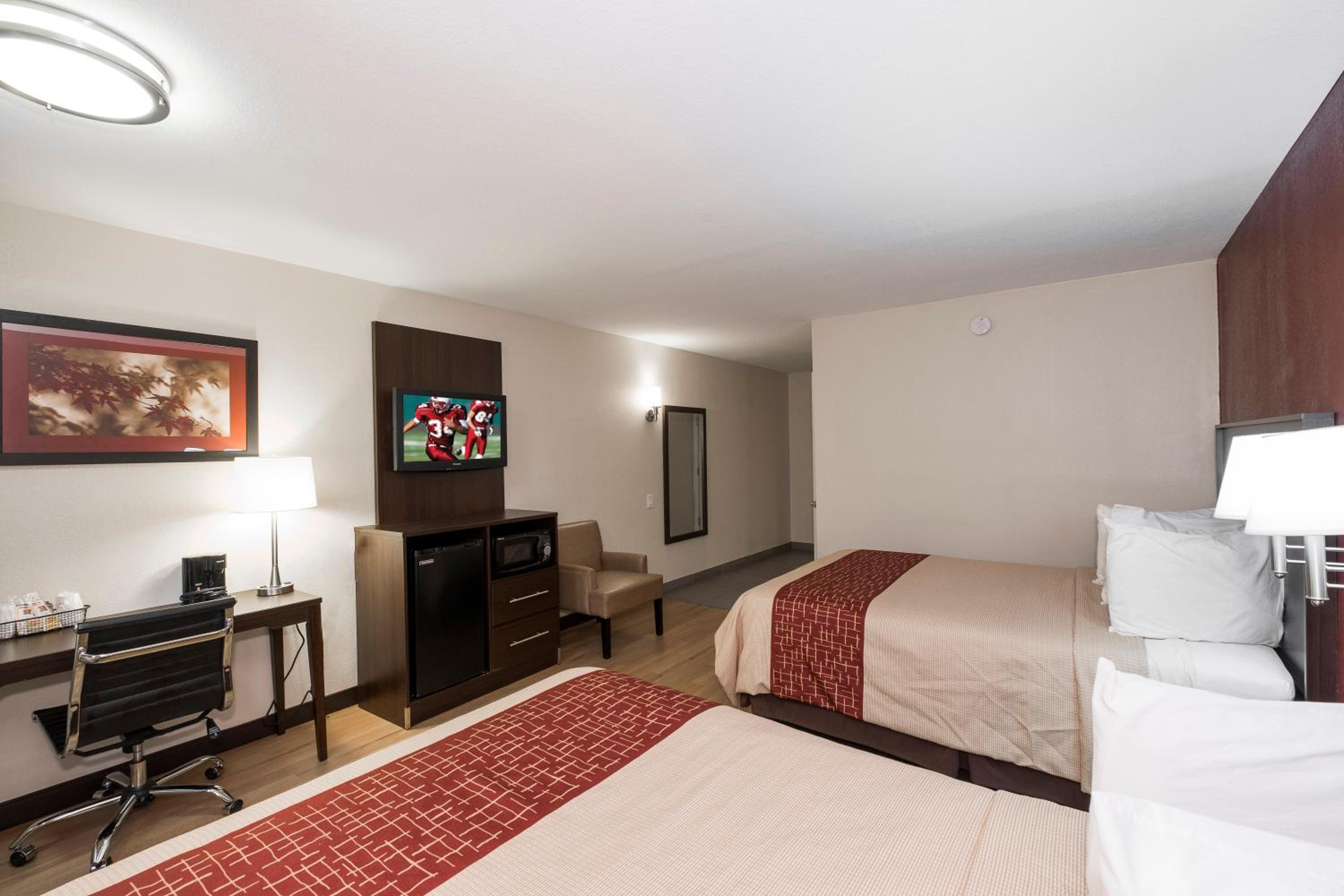 Deluxe Room with Two Queen Beds Smoke Free - Photo 1