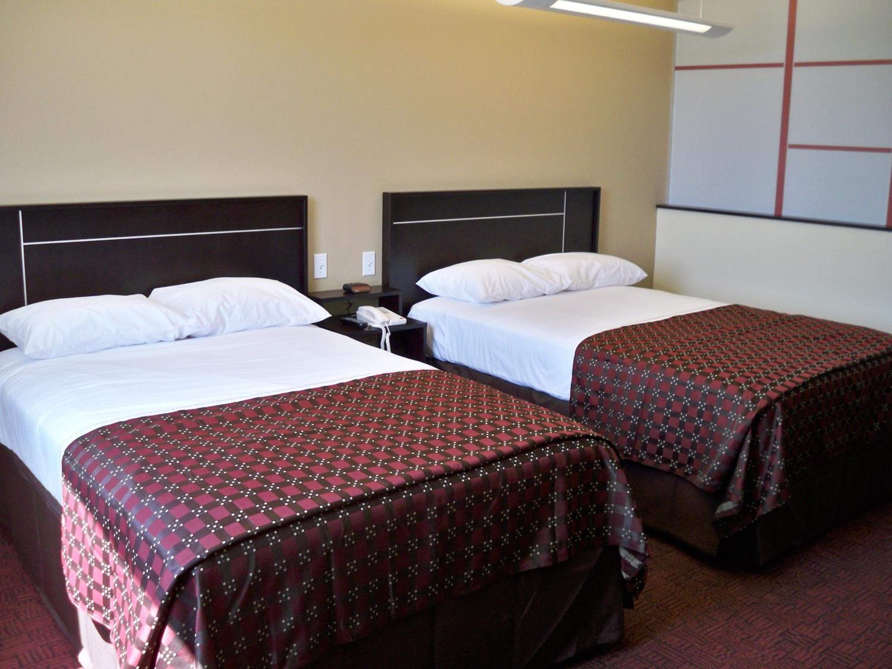 Deluxe Room with Two Double Beds Non-Smoking - Photo 1