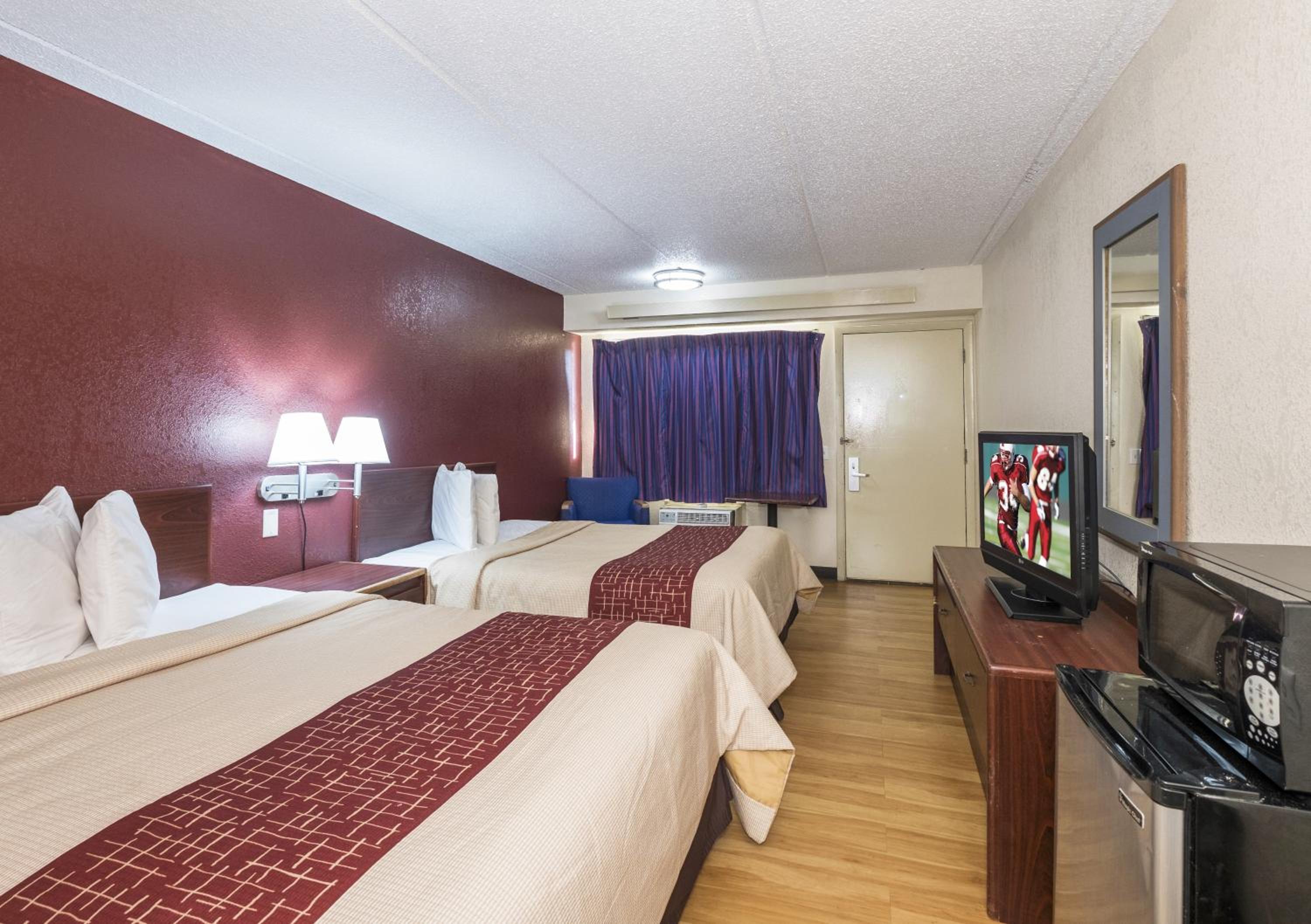 Deluxe Room with Two Queen Beds Smoking - Photo 1