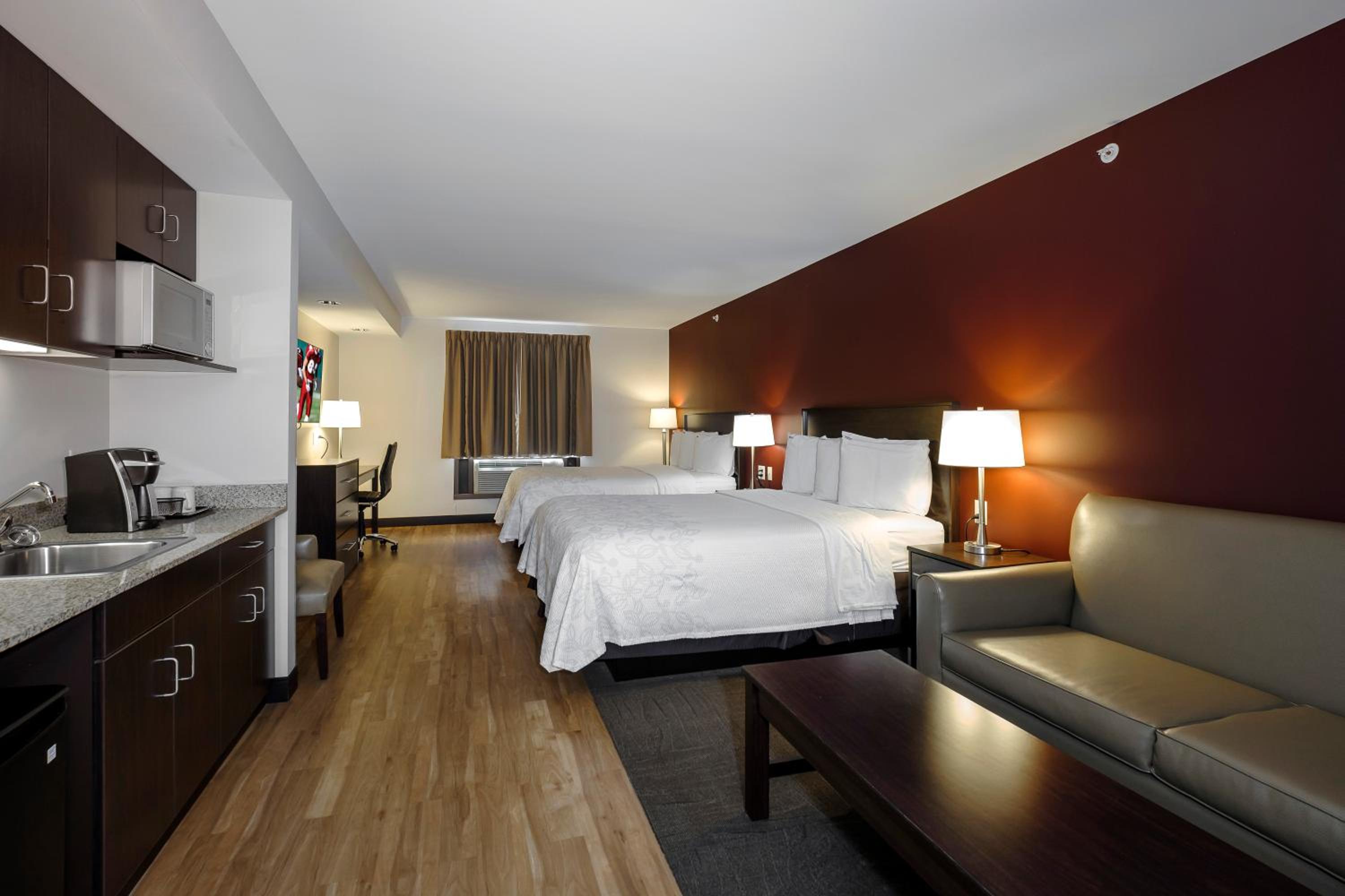 Suite with Two Queen Beds with Kitchenette and Sofabed Disability Access Smoke Free