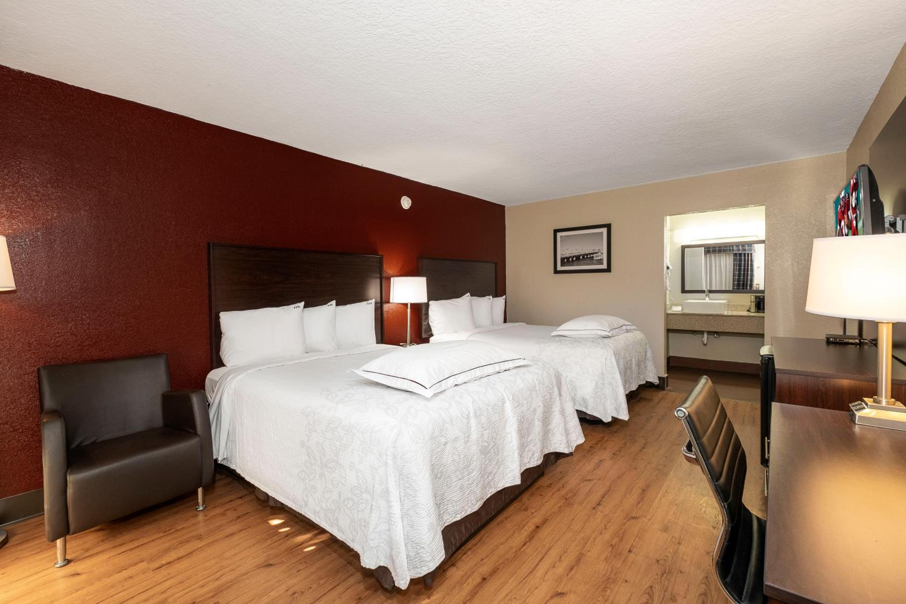Premium Room with Two Queen Beds Smoke Free (Upgraded Bedding and Snack Box) - Photo 1