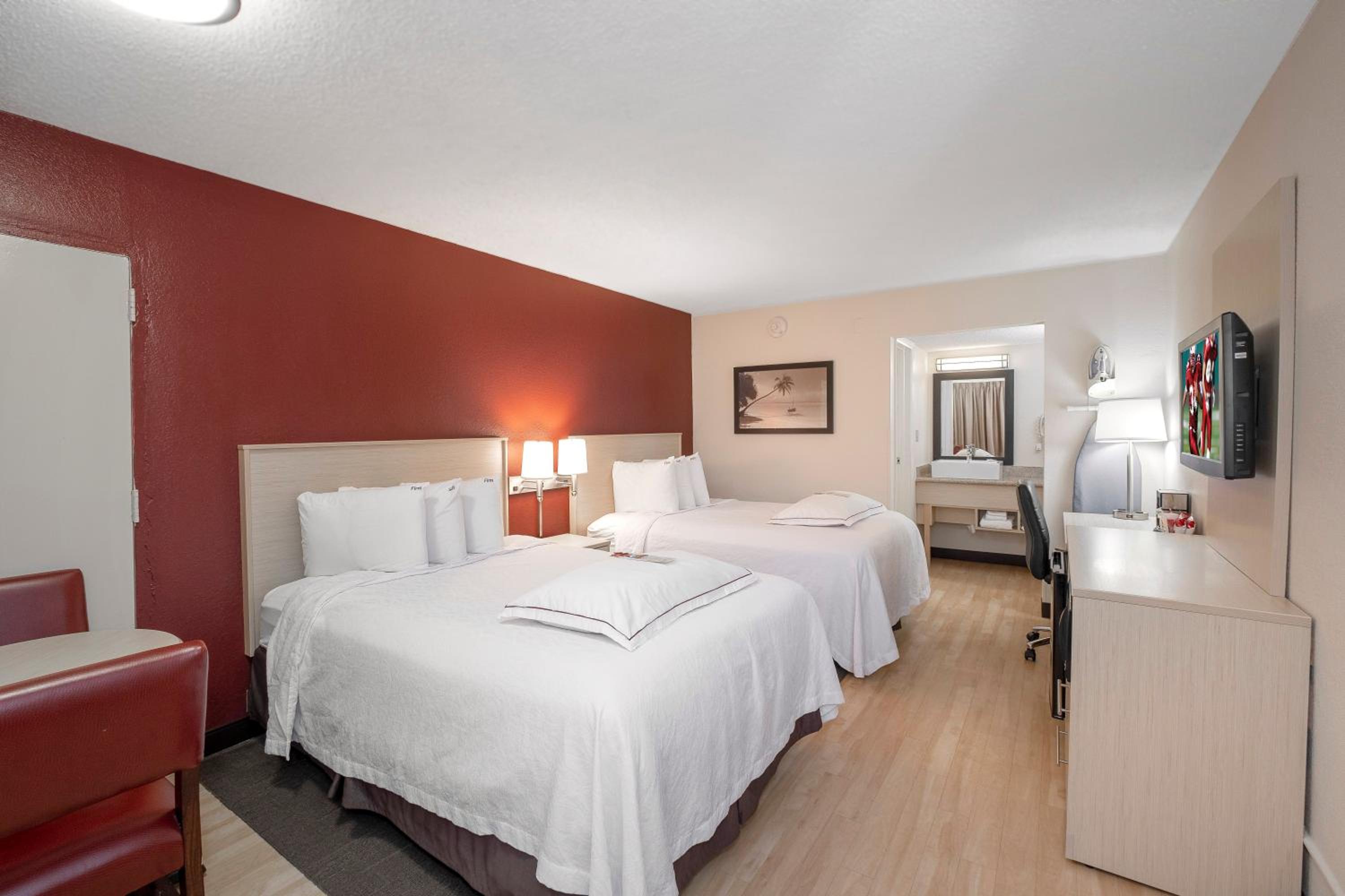 Premium Room with Two Double Beds Smoke Free (Upgraded Bedding & Snack) at Red Roof Inn PLUS+ & Suites Naples Downtown-5th Ave S in Naples
