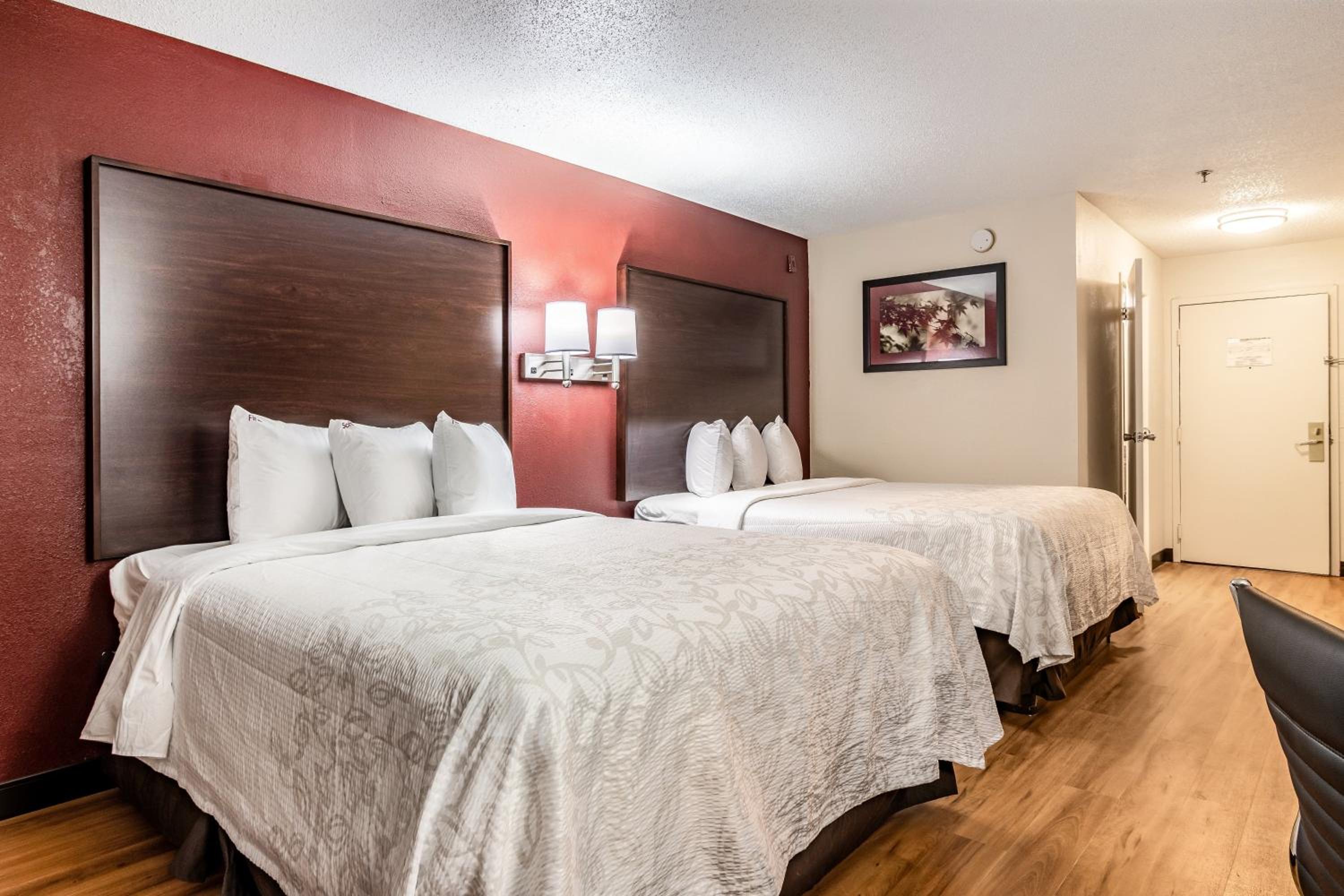  Superior with One King Bed & One Queen Bed Smoke Free