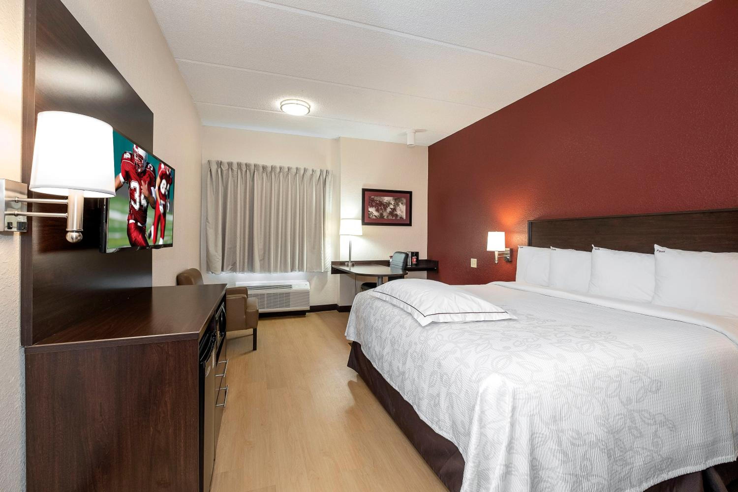 Premium King Room Smoke Free (Upgraded Bedding and Snack Box) - Photo 1