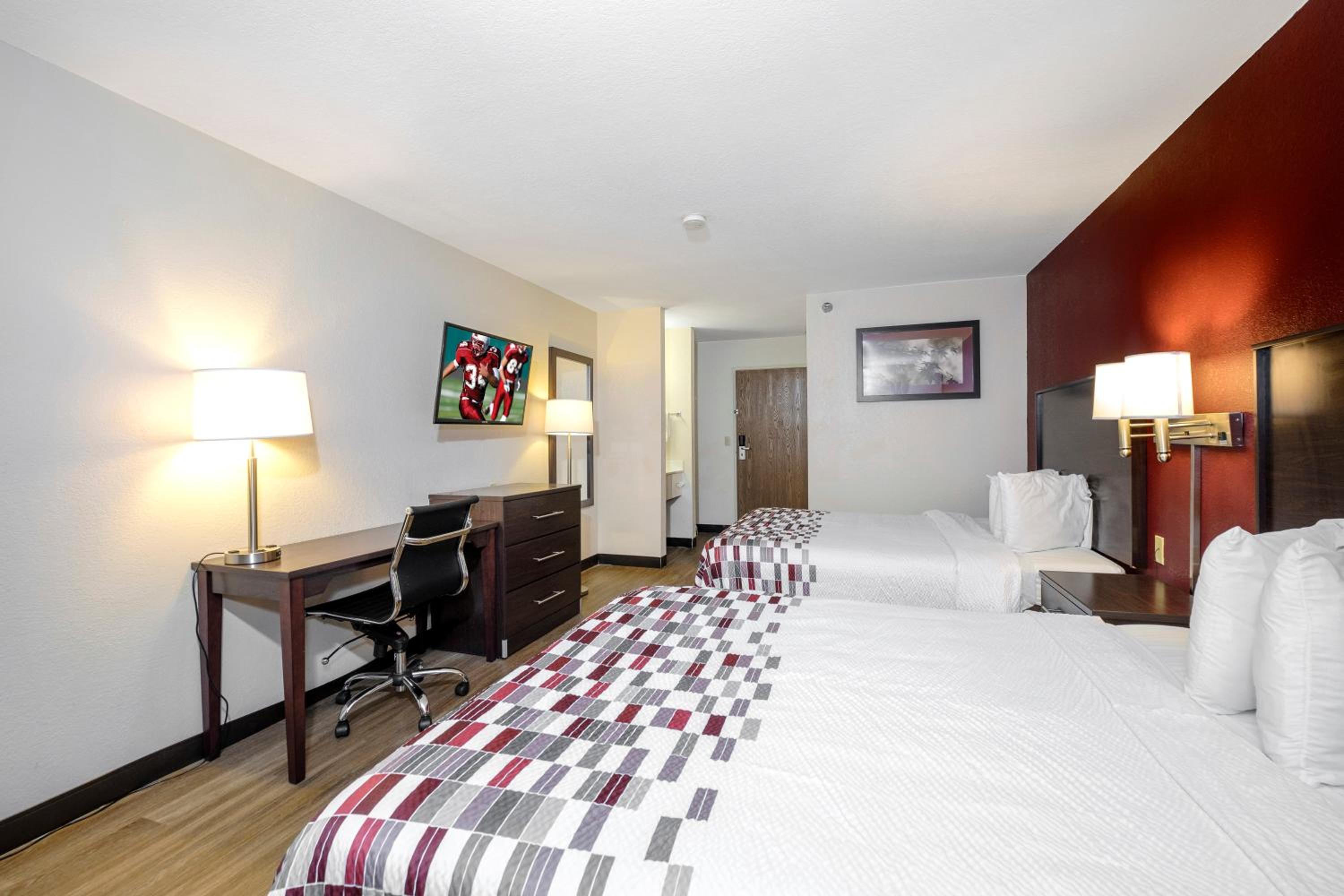  Deluxe Room with Two Queen Beds Smoking - Photo 1