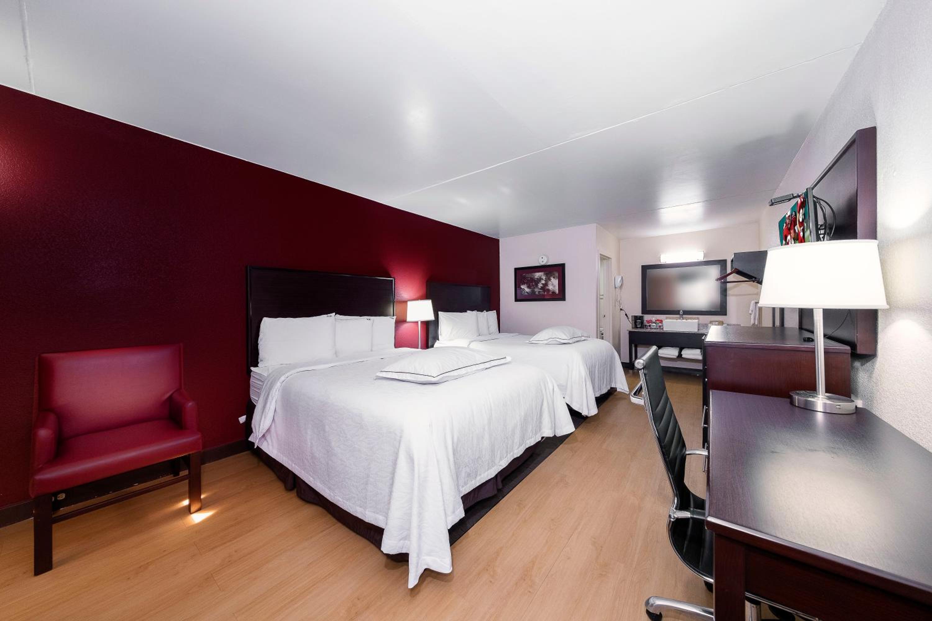 Premium Room with Two Queen Beds Smoke Free (Upgraded Bedding & Snack Box) photo 3