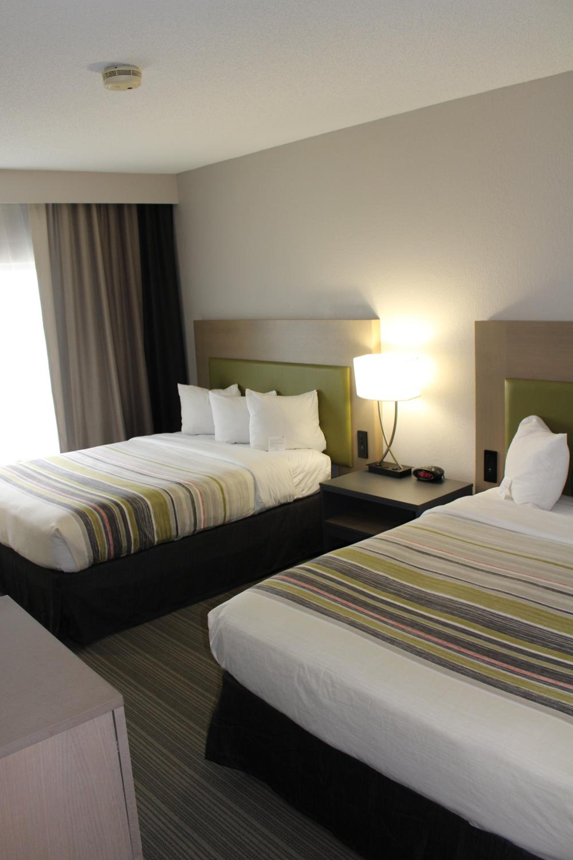 Queen Room with Two Queen Beds - Non-Smoking - Photo 1
