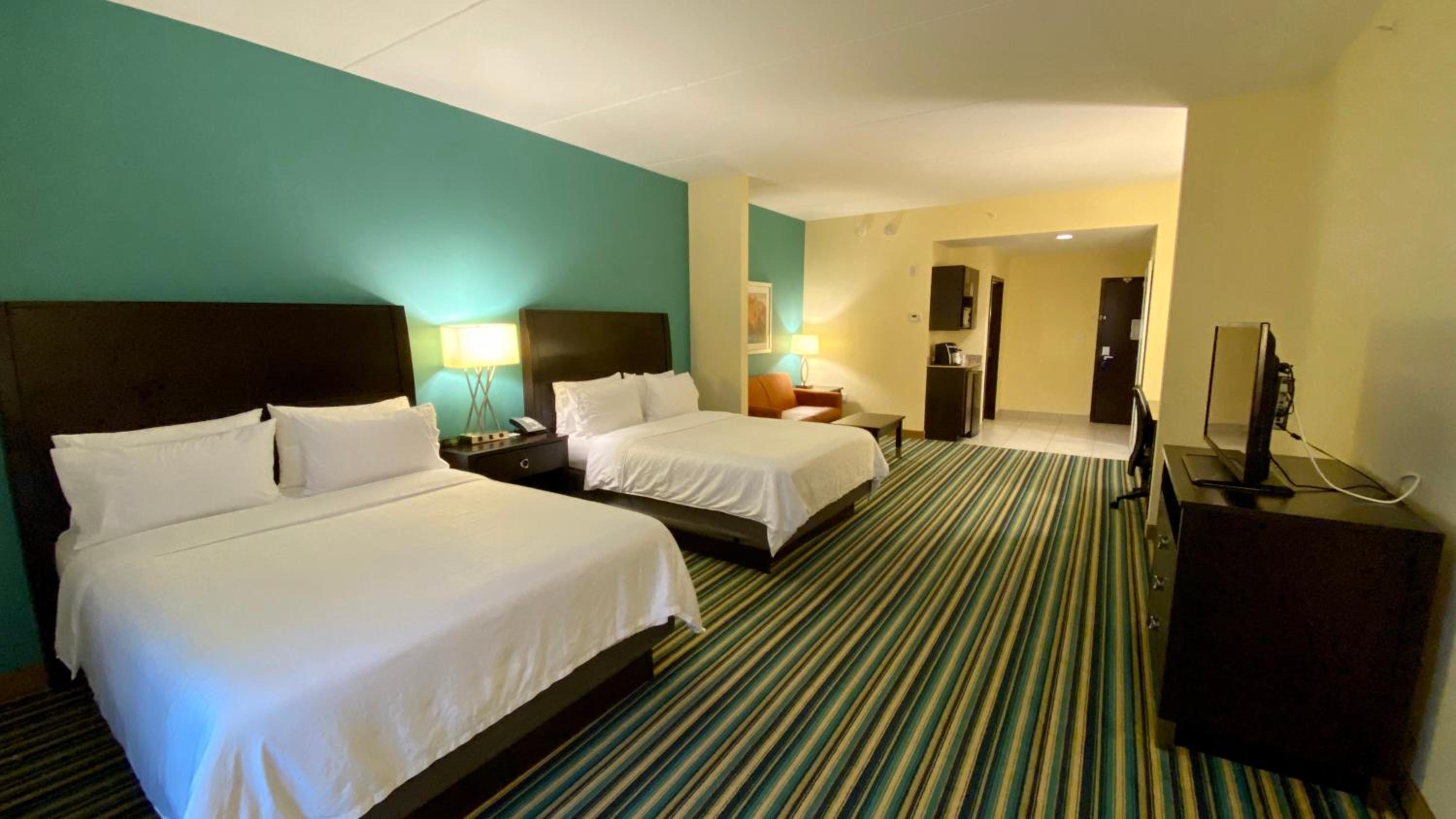 Queen Suite with Two Queen Beds and Sofa Bed