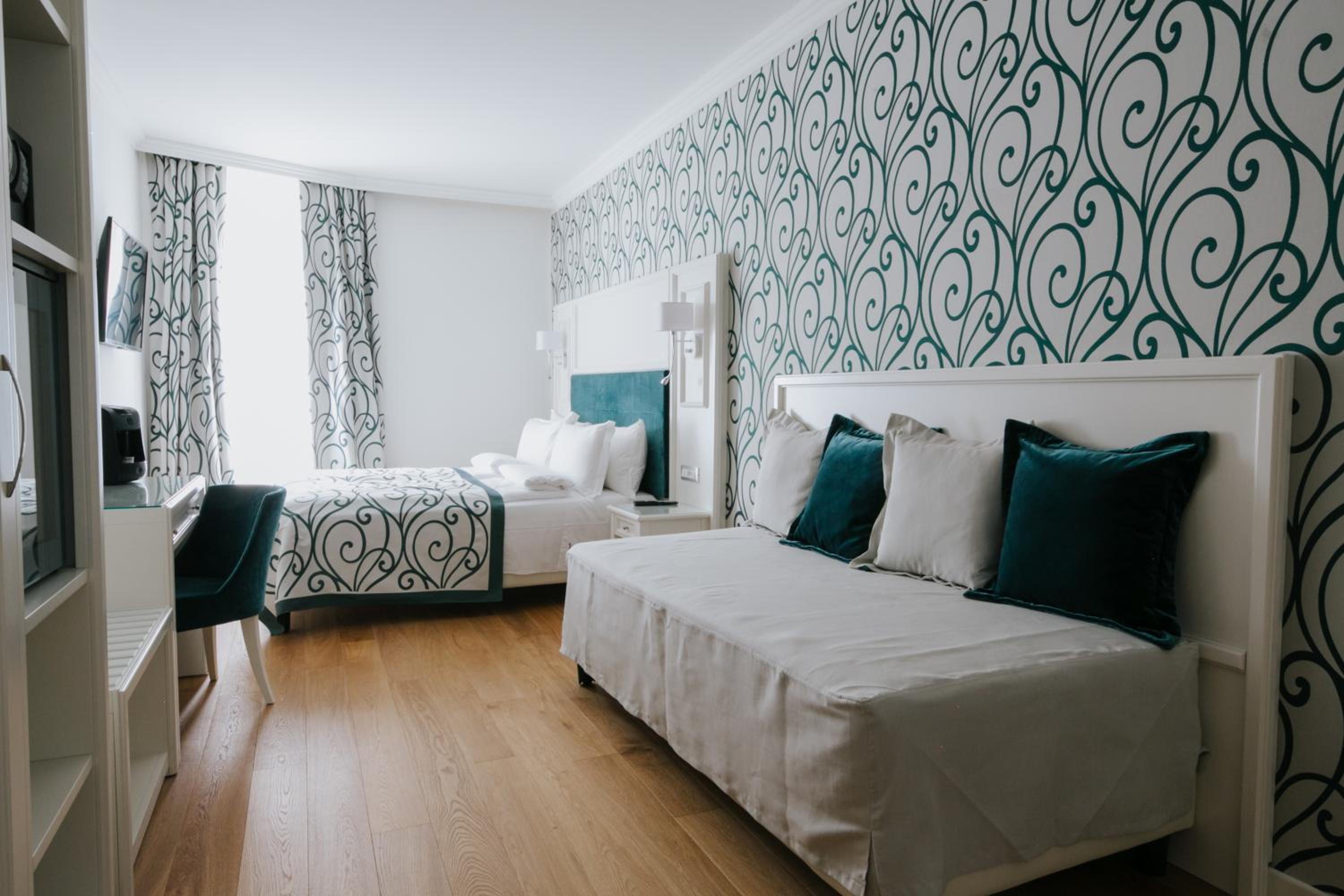 Deluxe Triple Room - Photo 8