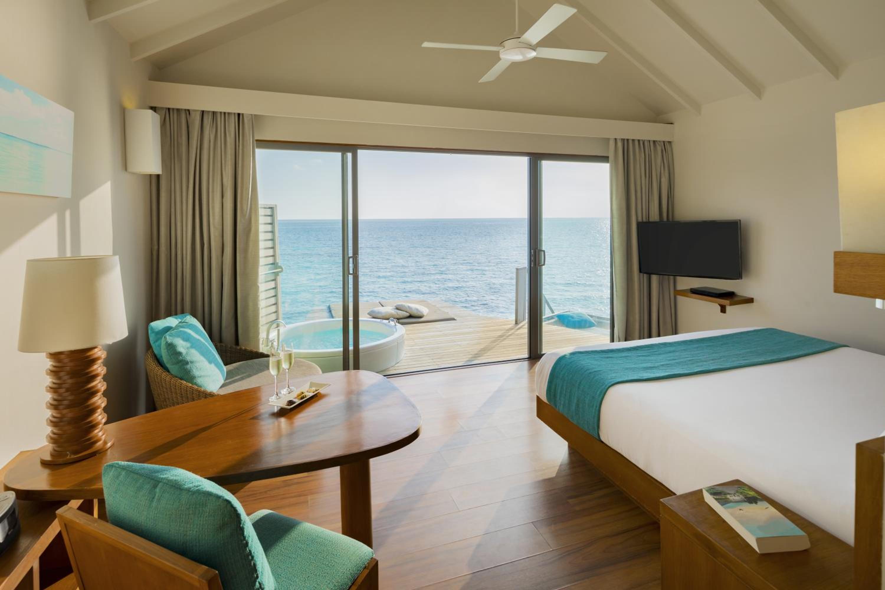 Sunset Overwater Villa with Swirl Pool King photo 3