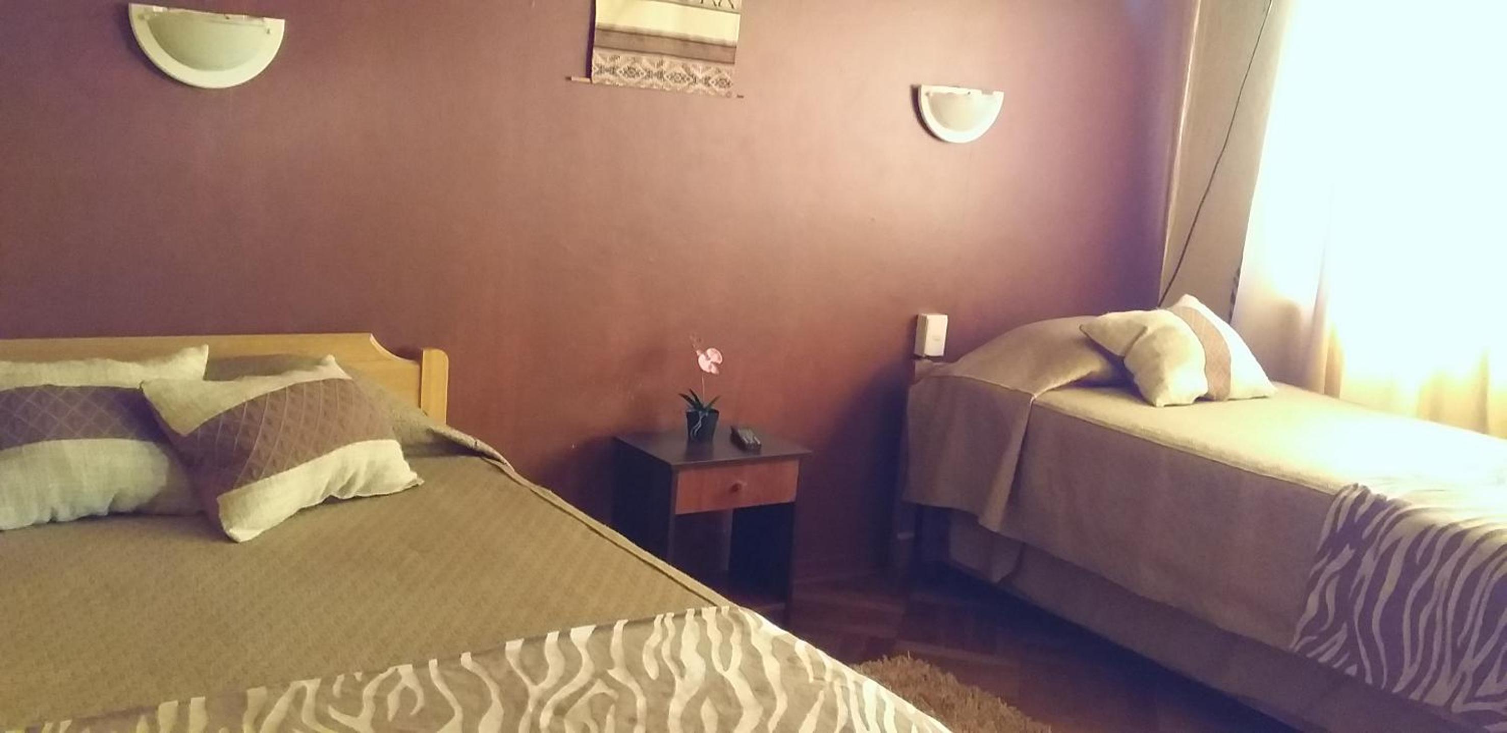 Quadruple Room with Private Bathroom