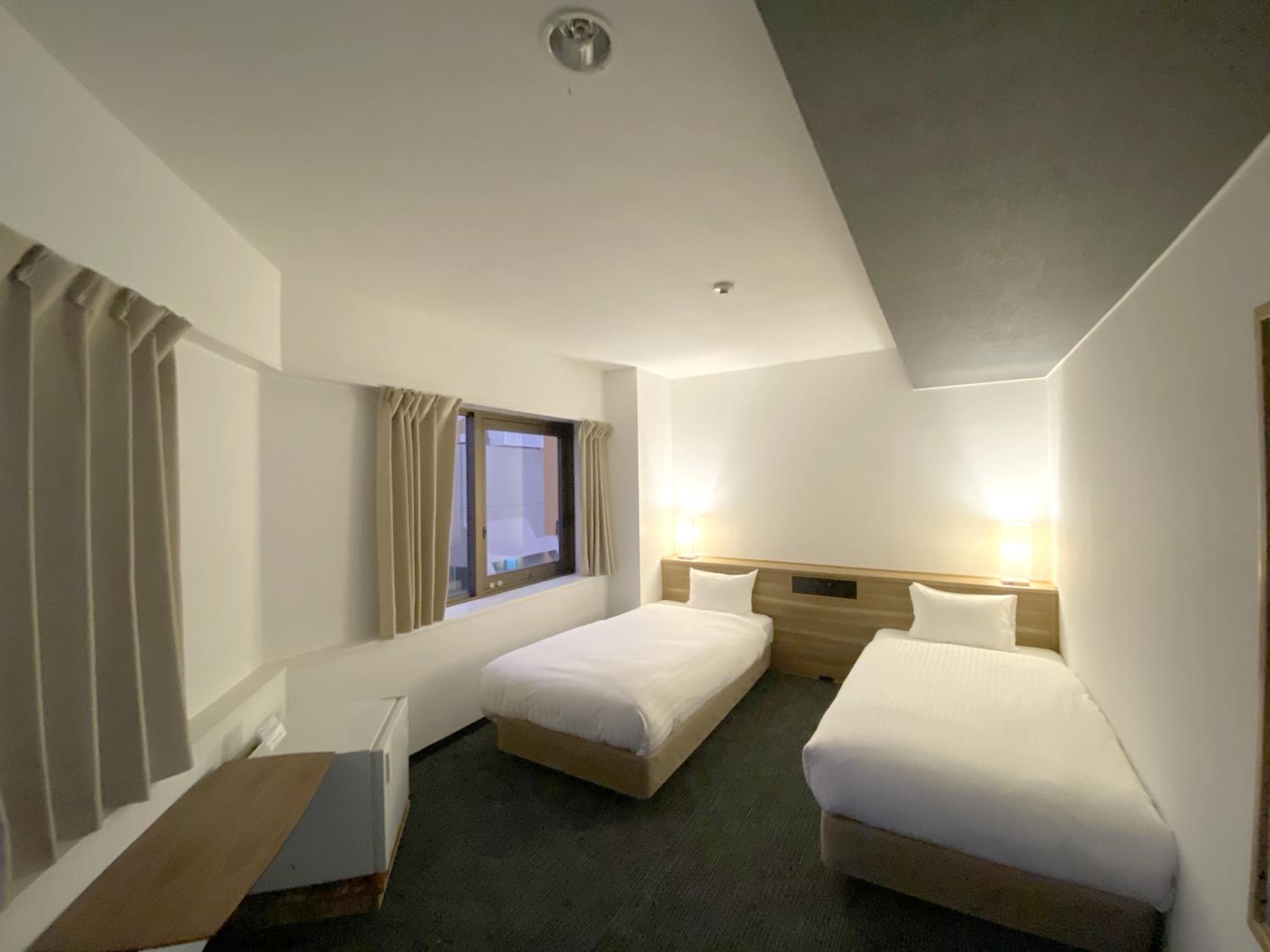 Economy Twin Room - Photo 1
