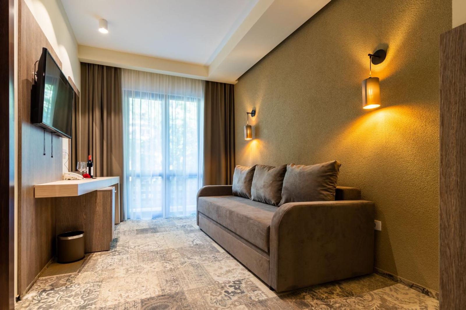 Apartment with Balcony - Photo 2